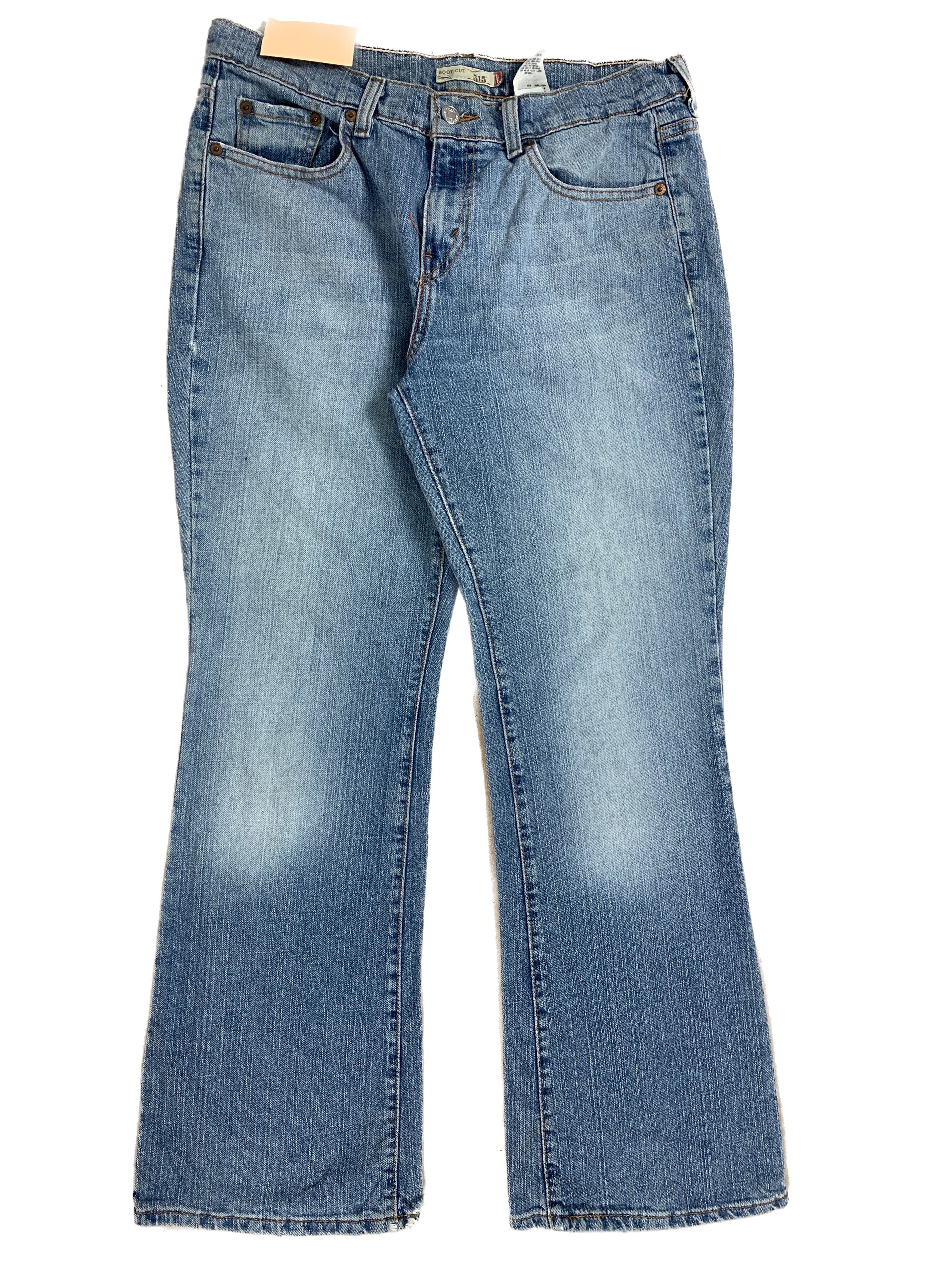 image of Levis x Vintage Levi's 515 Flared Bootcut Faded Light Wash Jeans in Blue Denim, Women's (Size 32)
