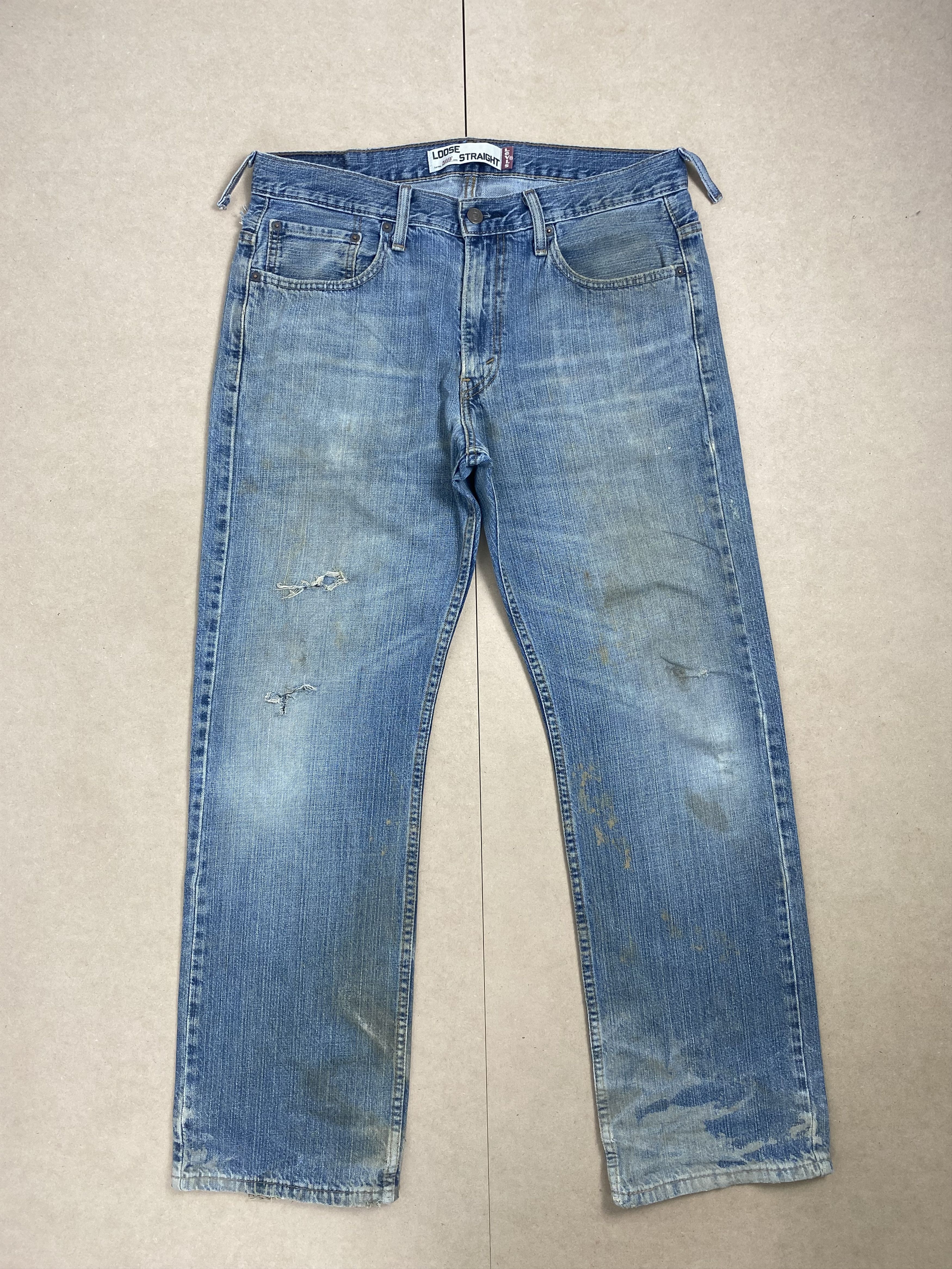 image of Levis 569 Straight Cut Faded Distress Mid Wash Jeans in Blue Distressed, Men's (Size 35)
