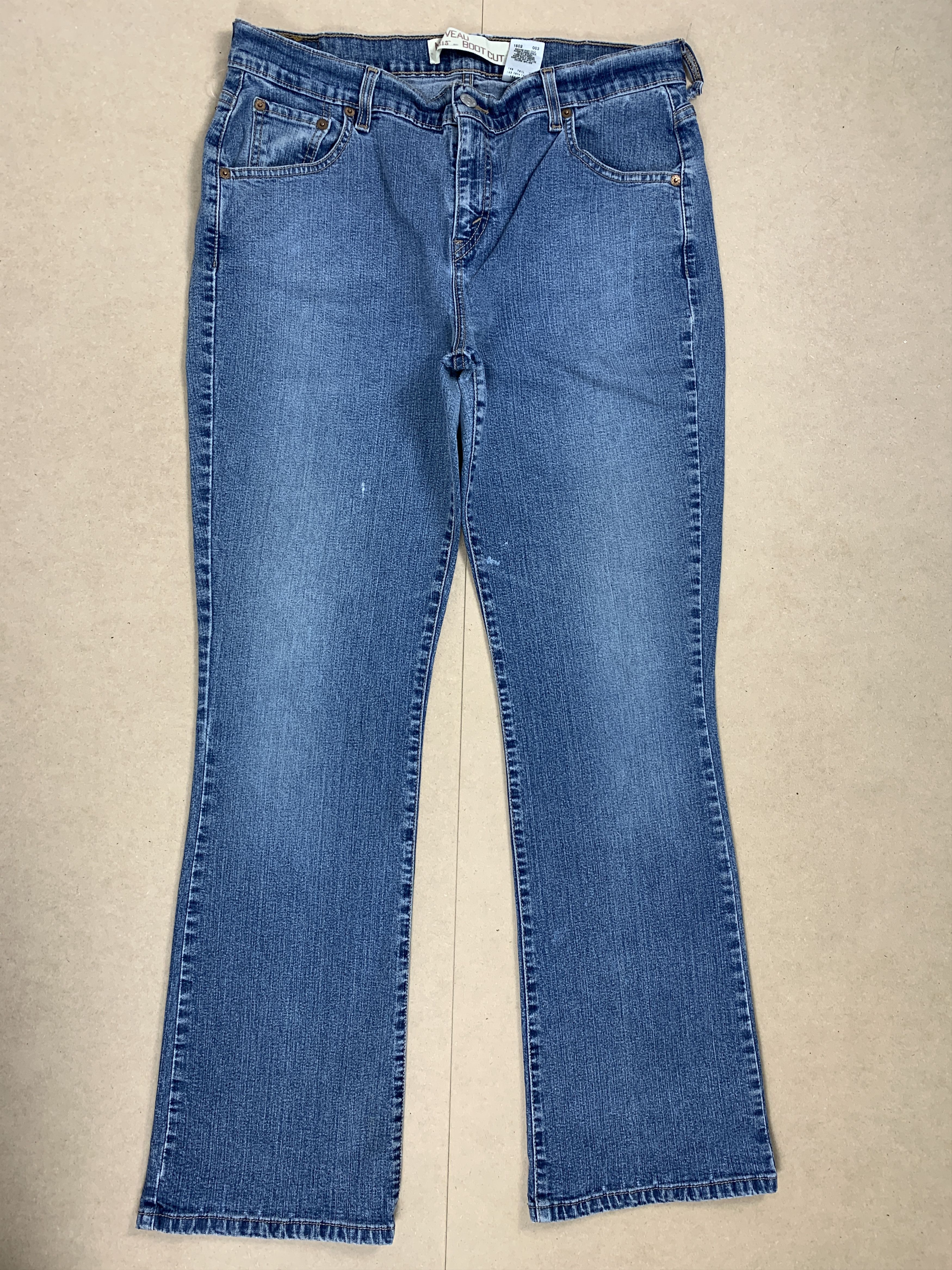 image of Levis 515 Boot Cut Faded Blue Jeans in Blue Denim, Women's (Size 32)