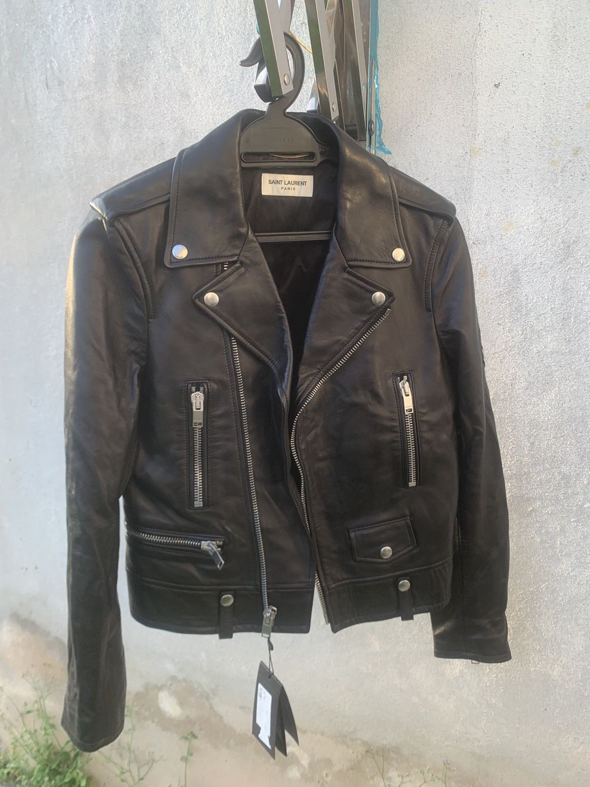 SAINT LAURENT leather knee biker jeans