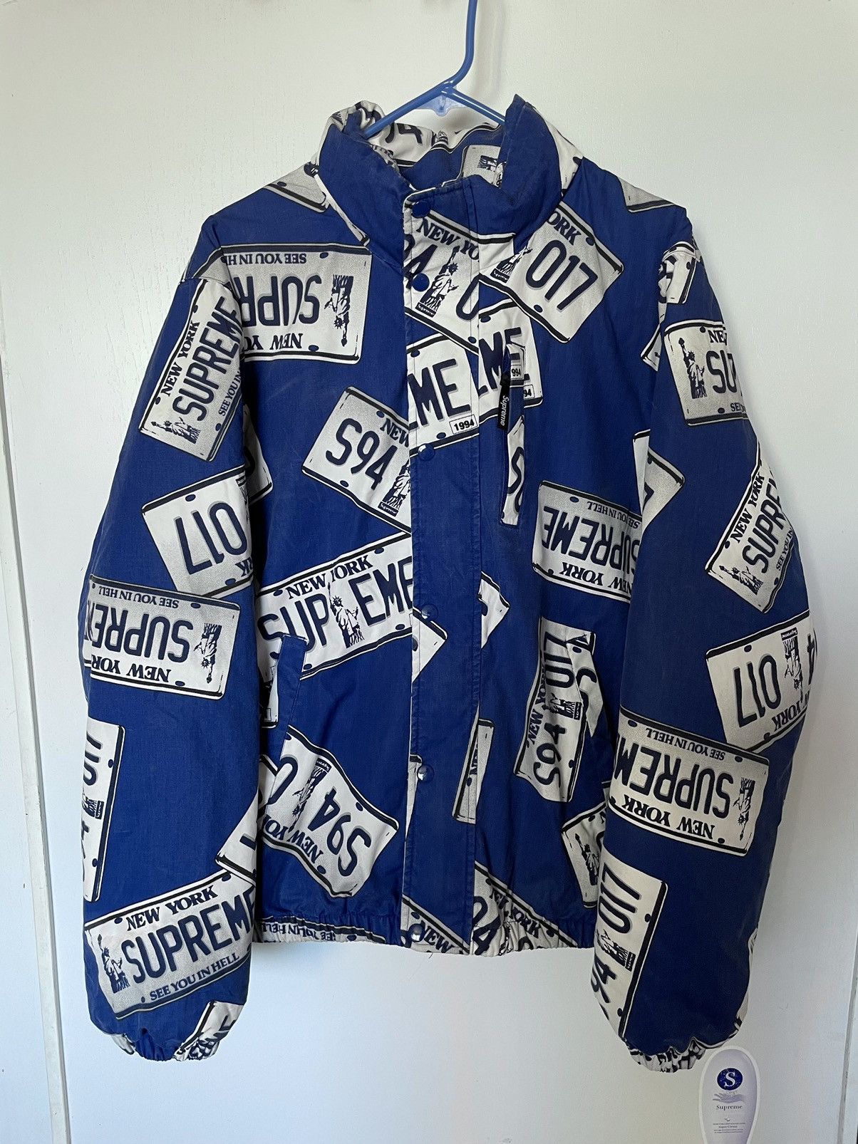 Supreme License Plate Puffy Jacket | Grailed