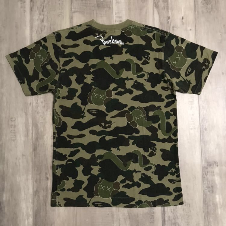 Bape × Kaws × Nigo BAPE x kaws bendy 1st camo green T-shirt a bathing ape NIGO Size US S / EU 44-46 / 1 - 4 Thumbnail