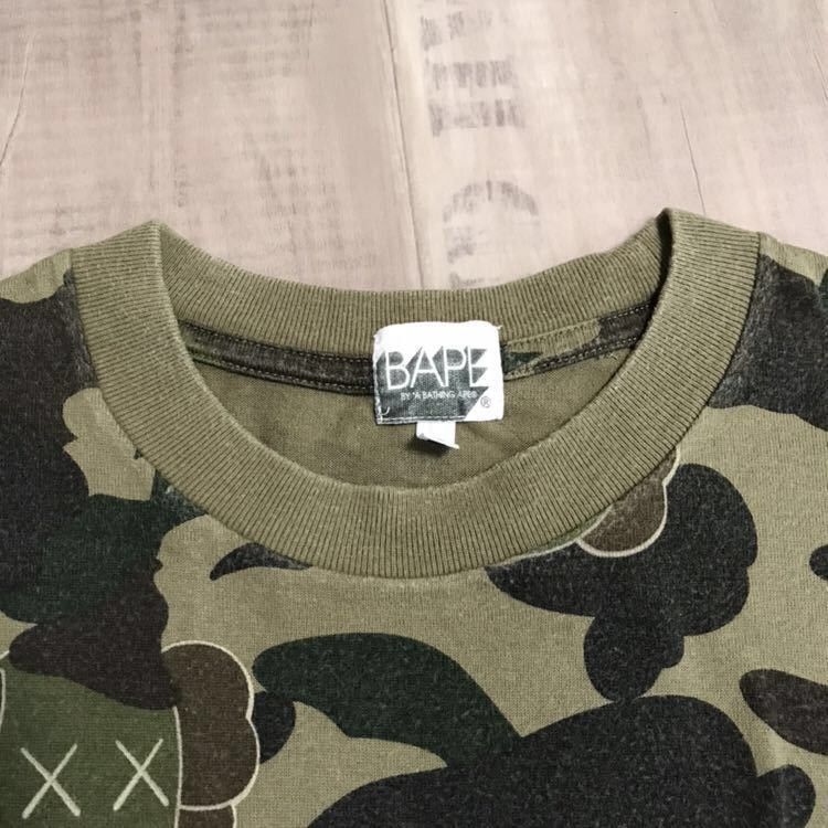 Bape × Kaws × Nigo BAPE x kaws bendy 1st camo green T-shirt a bathing ape NIGO Size US S / EU 44-46 / 1 - 3 Thumbnail