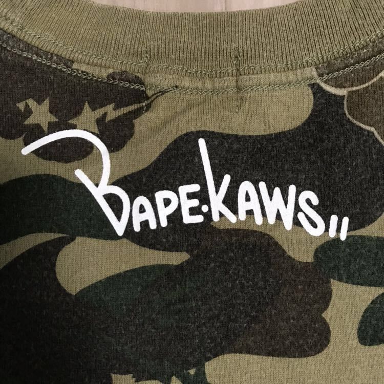 Bape × Kaws × Nigo BAPE x kaws bendy 1st camo green T-shirt a bathing ape NIGO Size US S / EU 44-46 / 1 - 5 Thumbnail