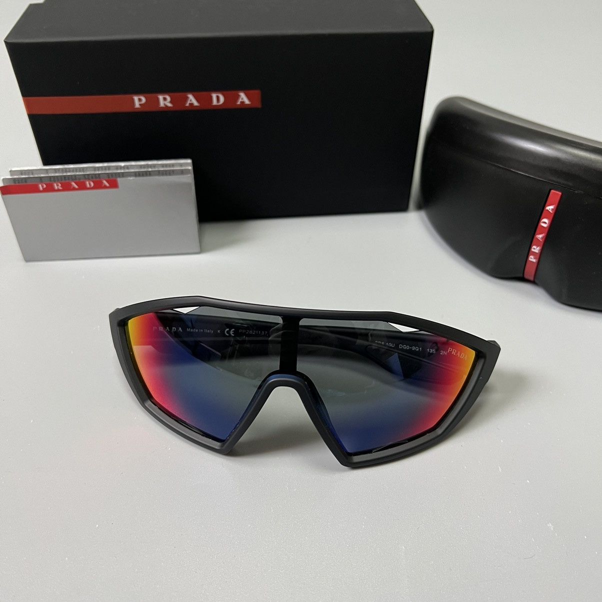 image of Archival Clothing x Prada New Prada Linea Rossa Injected Sports Wrap Sunglasses Hype in Black, Men'