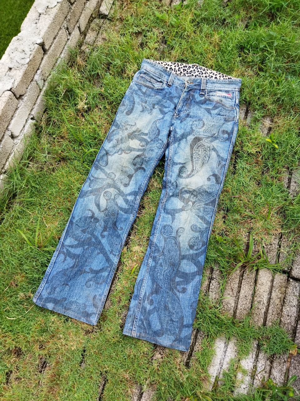 image of Hideaways x Vintage Nicole Club For Men Overprint Flared Jeans in Blue Distressed (Size 33)