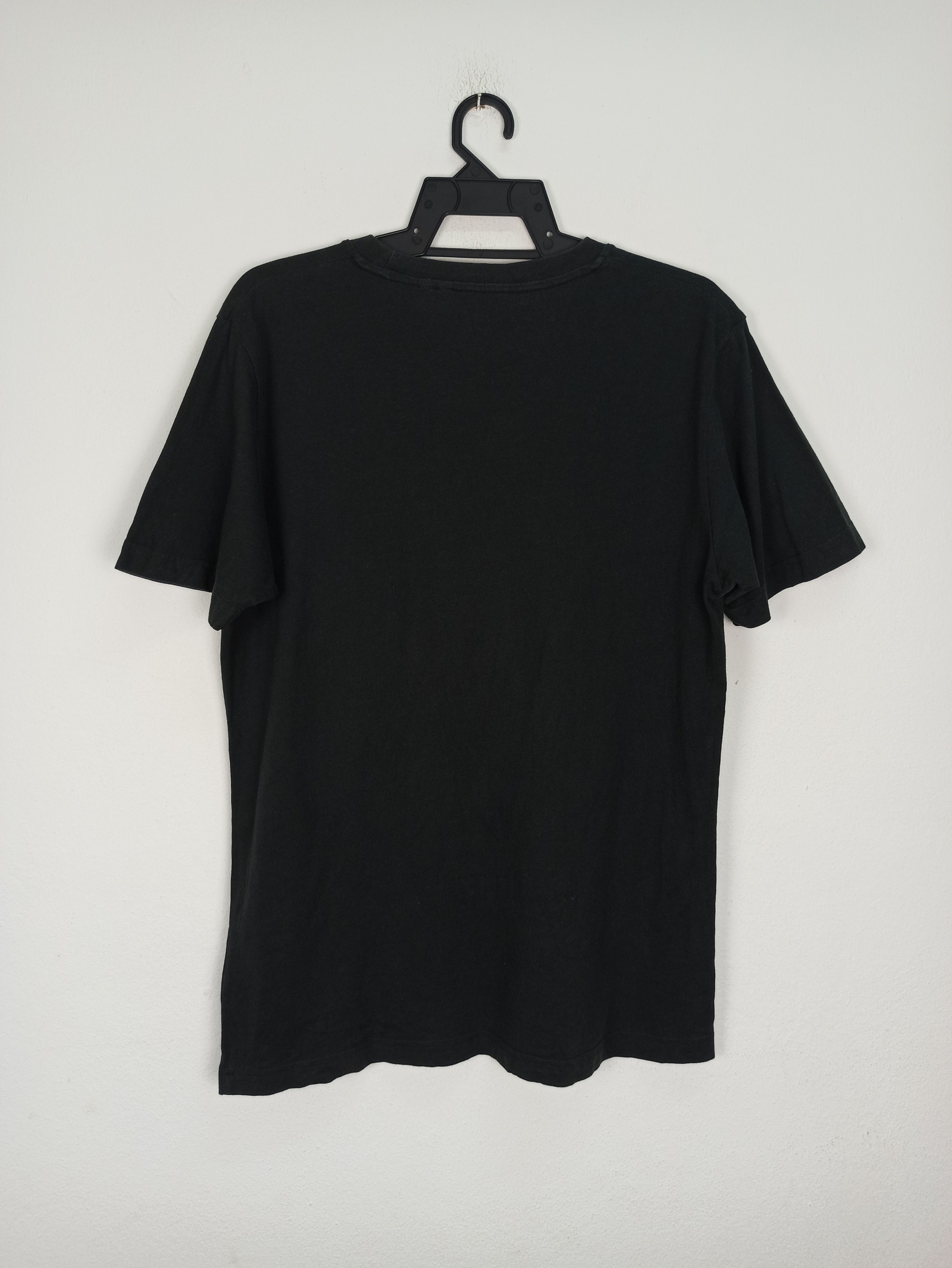 Cartoon Network Steals M&M's Chocolate by Uniqlo (c41) Size US L / EU 52-54 / 3 - 3 Thumbnail
