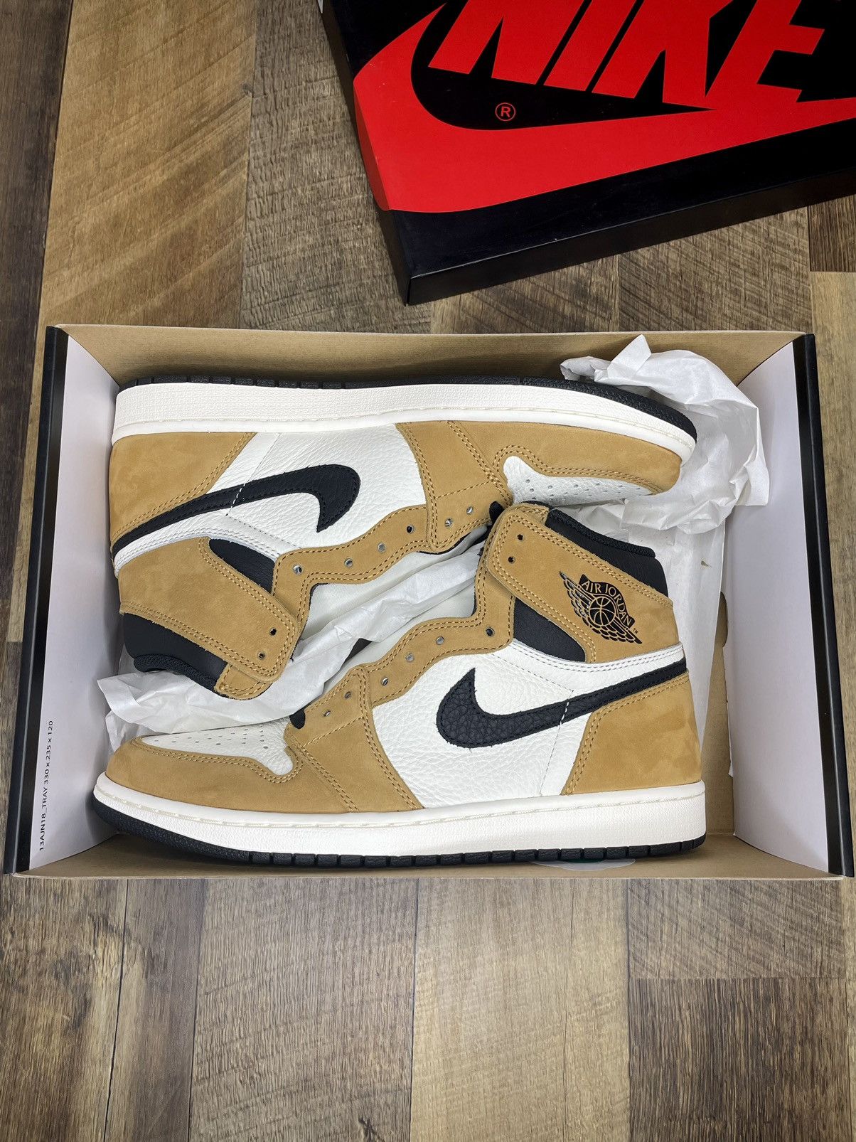 image of Jordan Nike Air Jordan 1 Retro High OG Rookie Of The Year 2018 Shoes in Brown, Men's (Size 10)