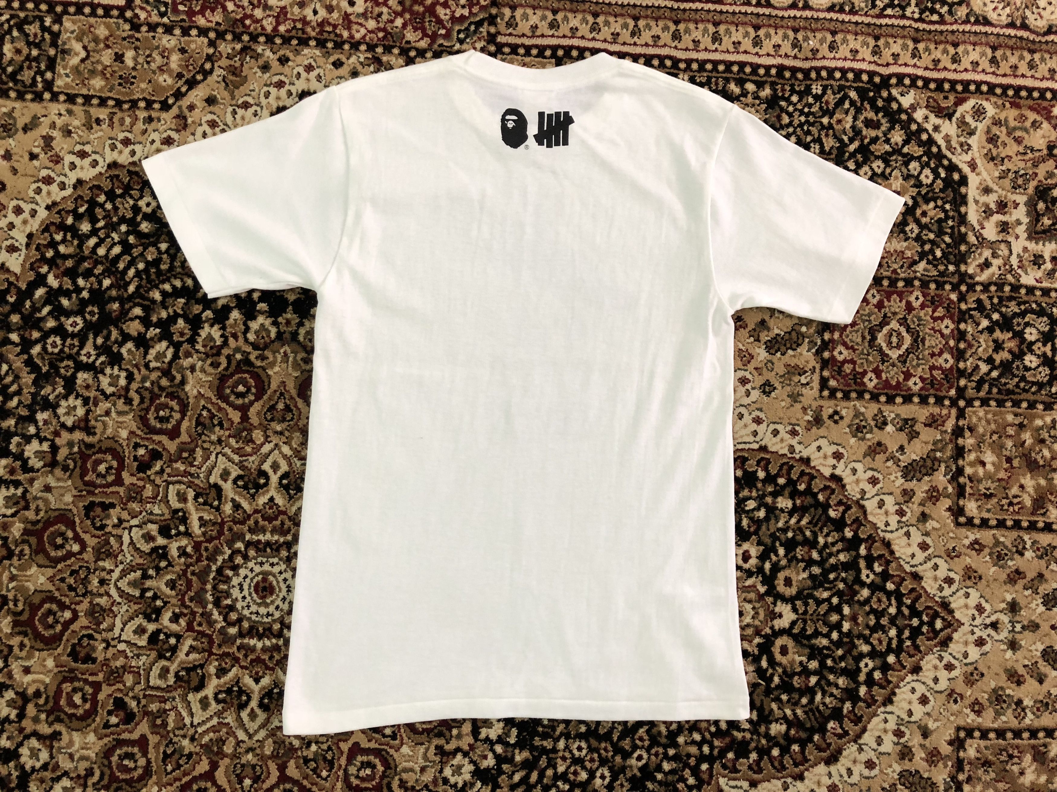 Bape × Undefeated Bape x Undefeated The Bape Boys Tee Size US S / EU 44-46 / 1 - 4 Thumbnail