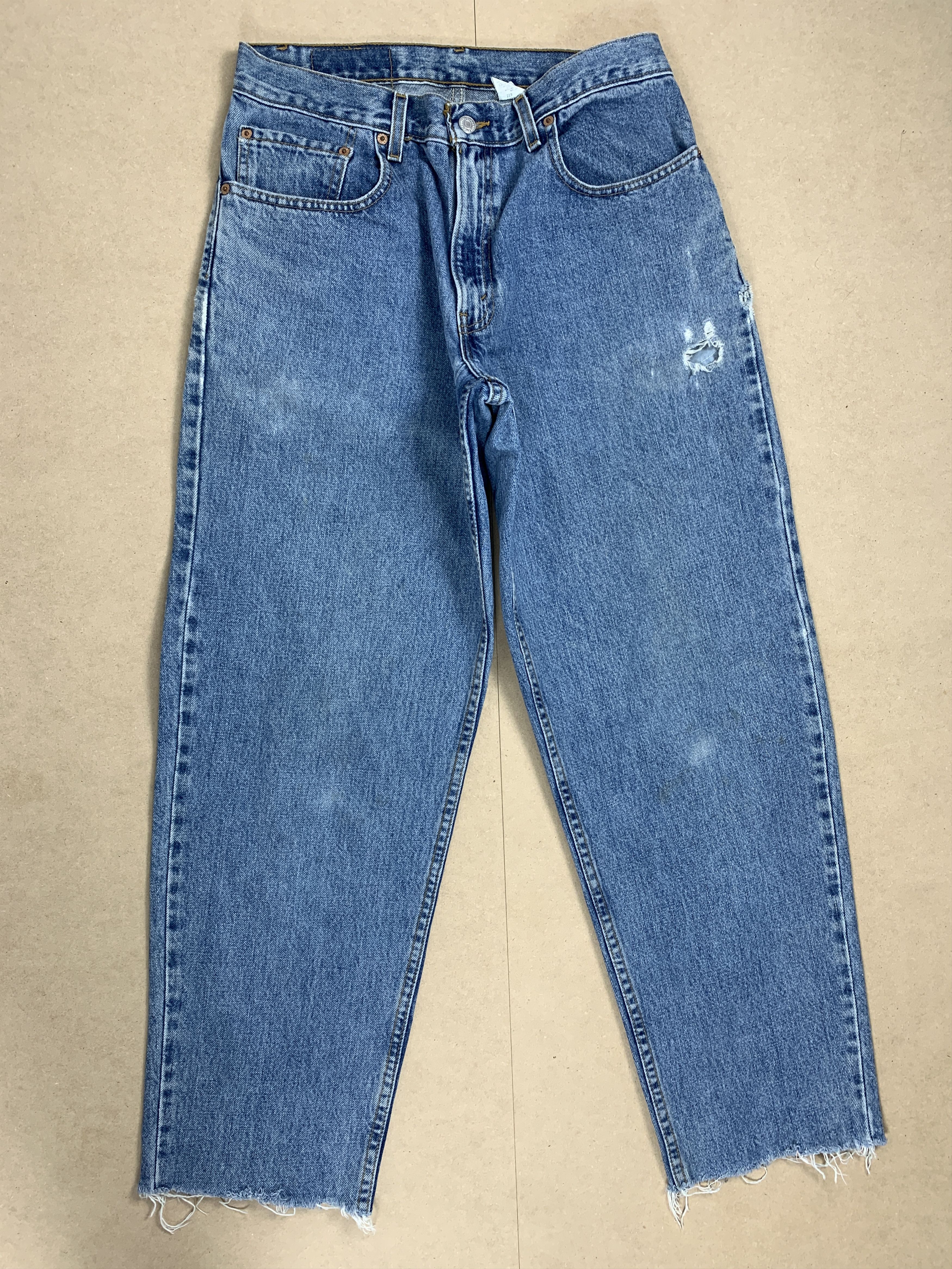image of Levis x Vintage Levi's 560 Loose Fit Distressed Mid Wash Jeans in Denim Blue, Men's (Size 29)