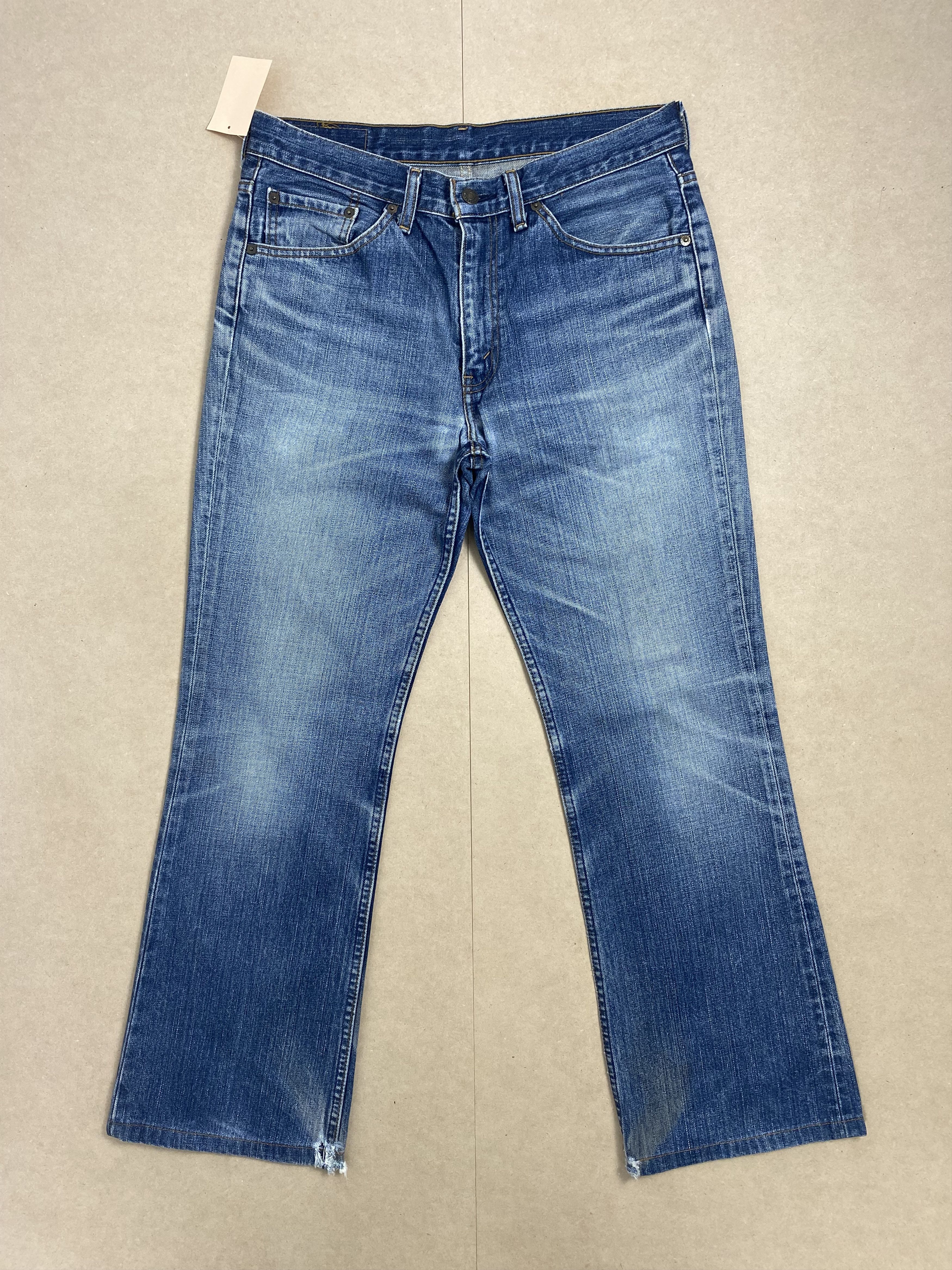 image of Levis x Vintage Levi's 517 Flared Boot Cut Faded Mid Wash Jeans in Blue Denim, Men's (Size 34)