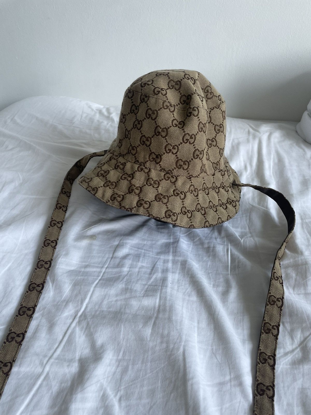 Gucci REVERSIBLE HAT IN GG CANVAS AND NYLON Grailed