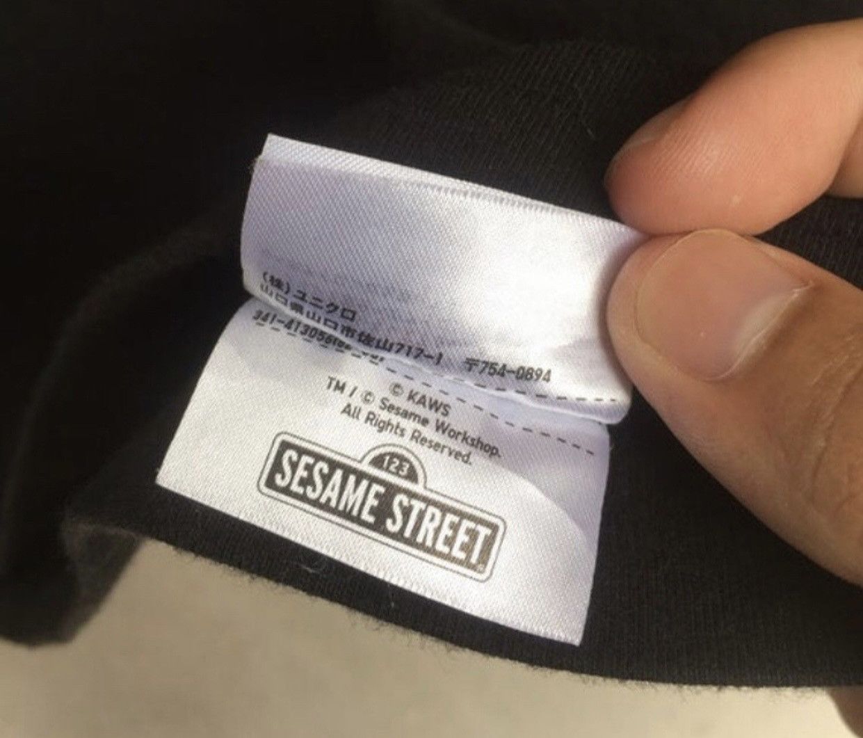 Kaws × Uniqlo Kaws x Sesame Street Cookie Monster pocket streetwear tee Size US S / EU 44-46 / 1 - 4 Thumbnail