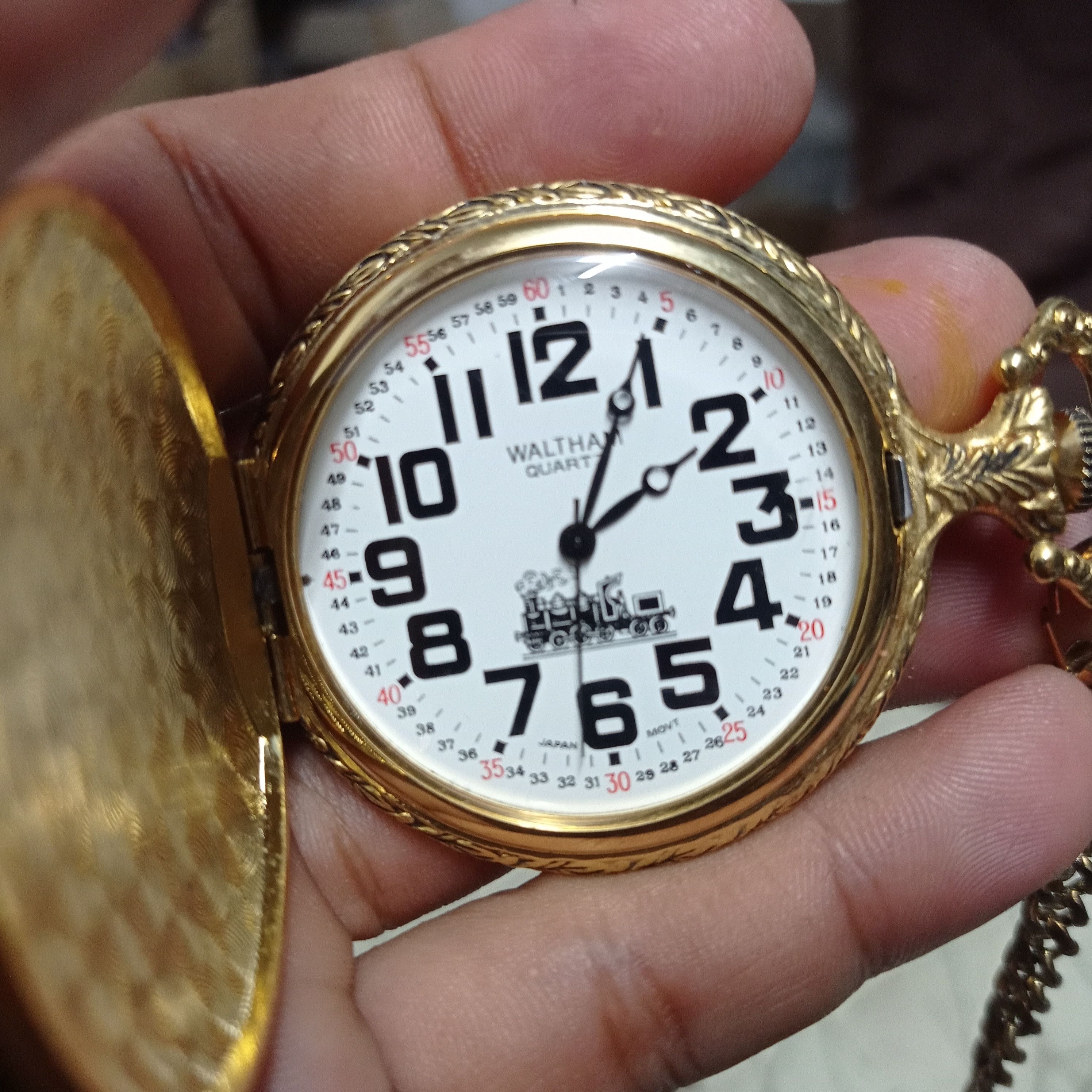 Majestron quartz pocket online watch train