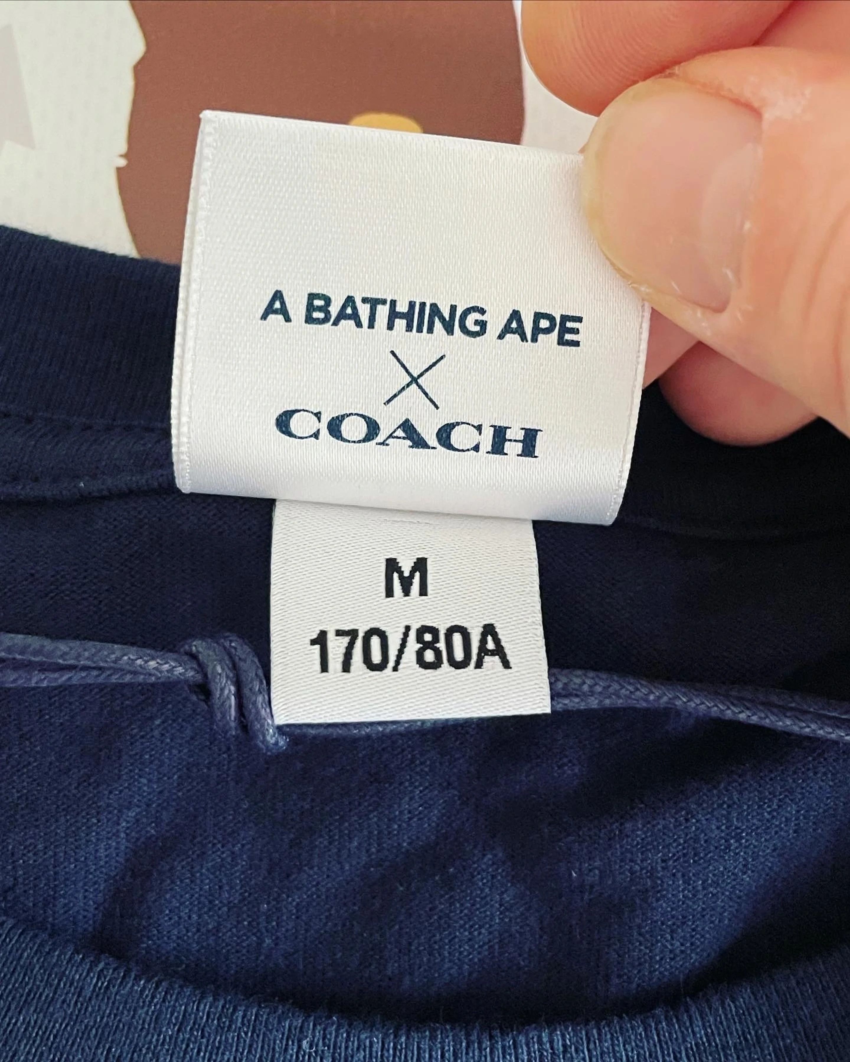 Bape × Coach BAPE X COACH COLLEGE TEE NAVY Size US M / EU 48-50 / 2 - 5 Thumbnail