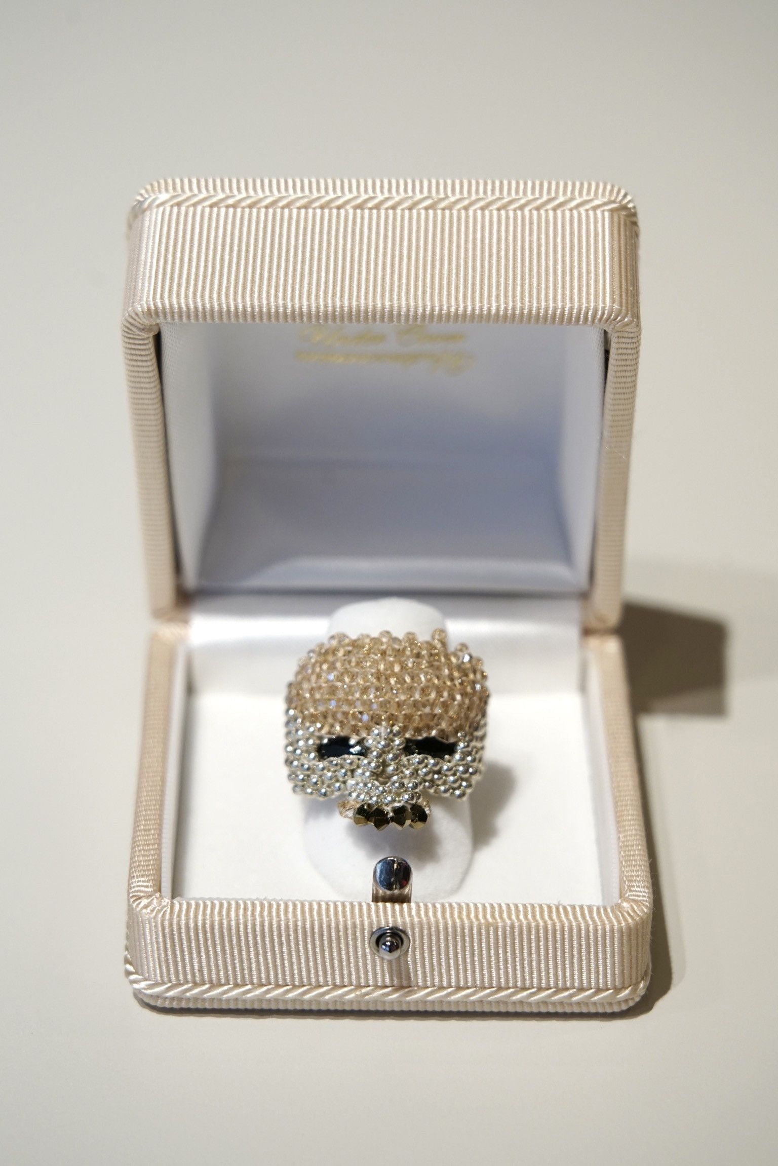 image of Undercover Glass Beads Skull Ring in Light Gold, Men's