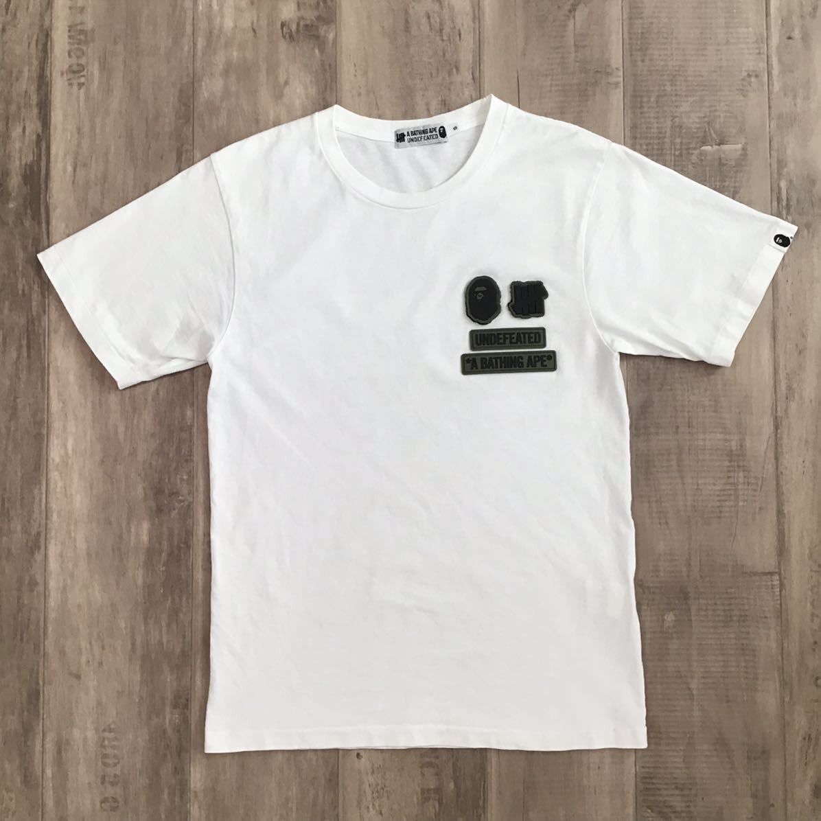 Bape × Undefeated BAPE × undefeated logo T-shirt a bathing ape Size US S / EU 44-46 / 1 - 2 Thumbnail