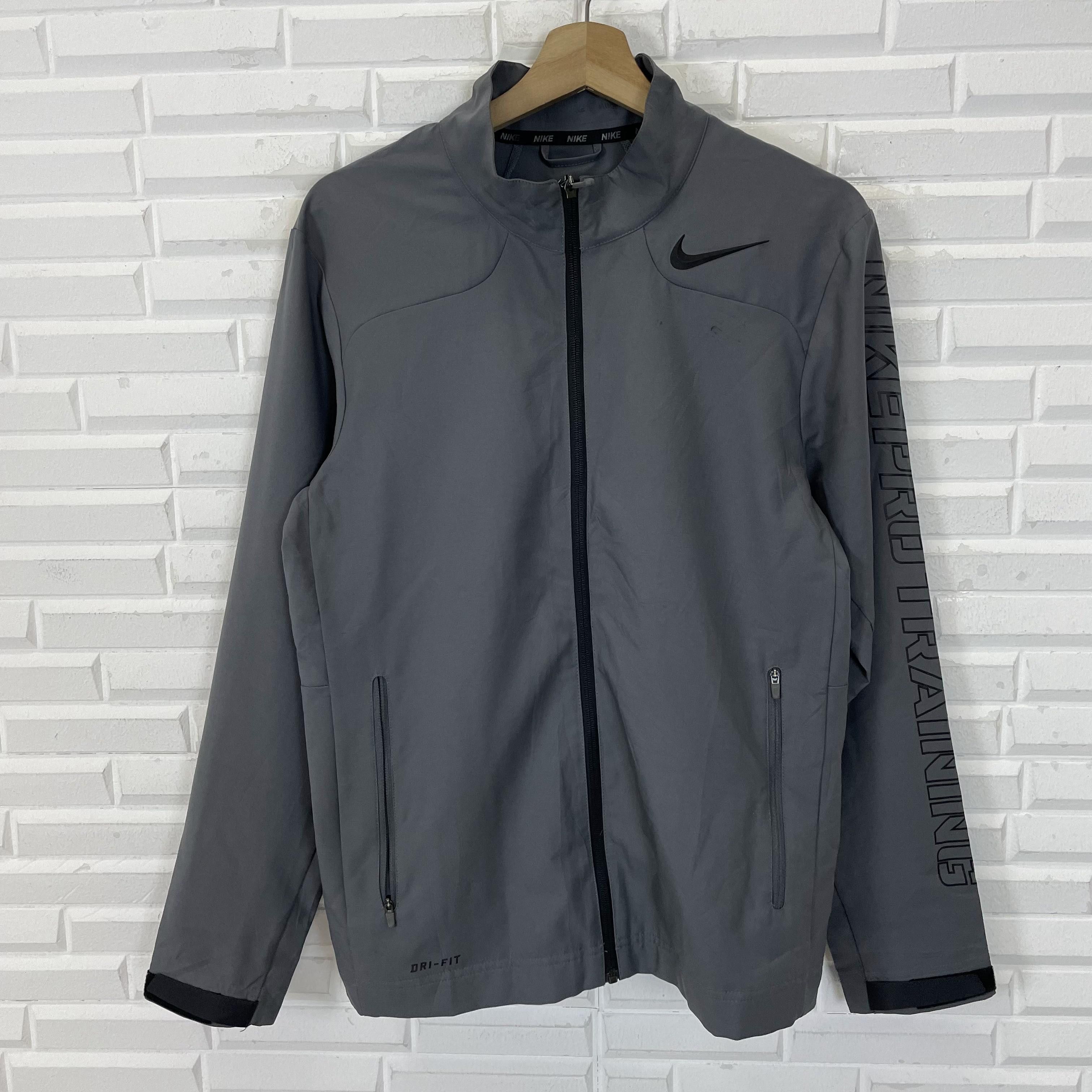 image of Nike Pro Training Dri-Fit Windbreaker Swoosh Out in Grey, Men's (Size Small)