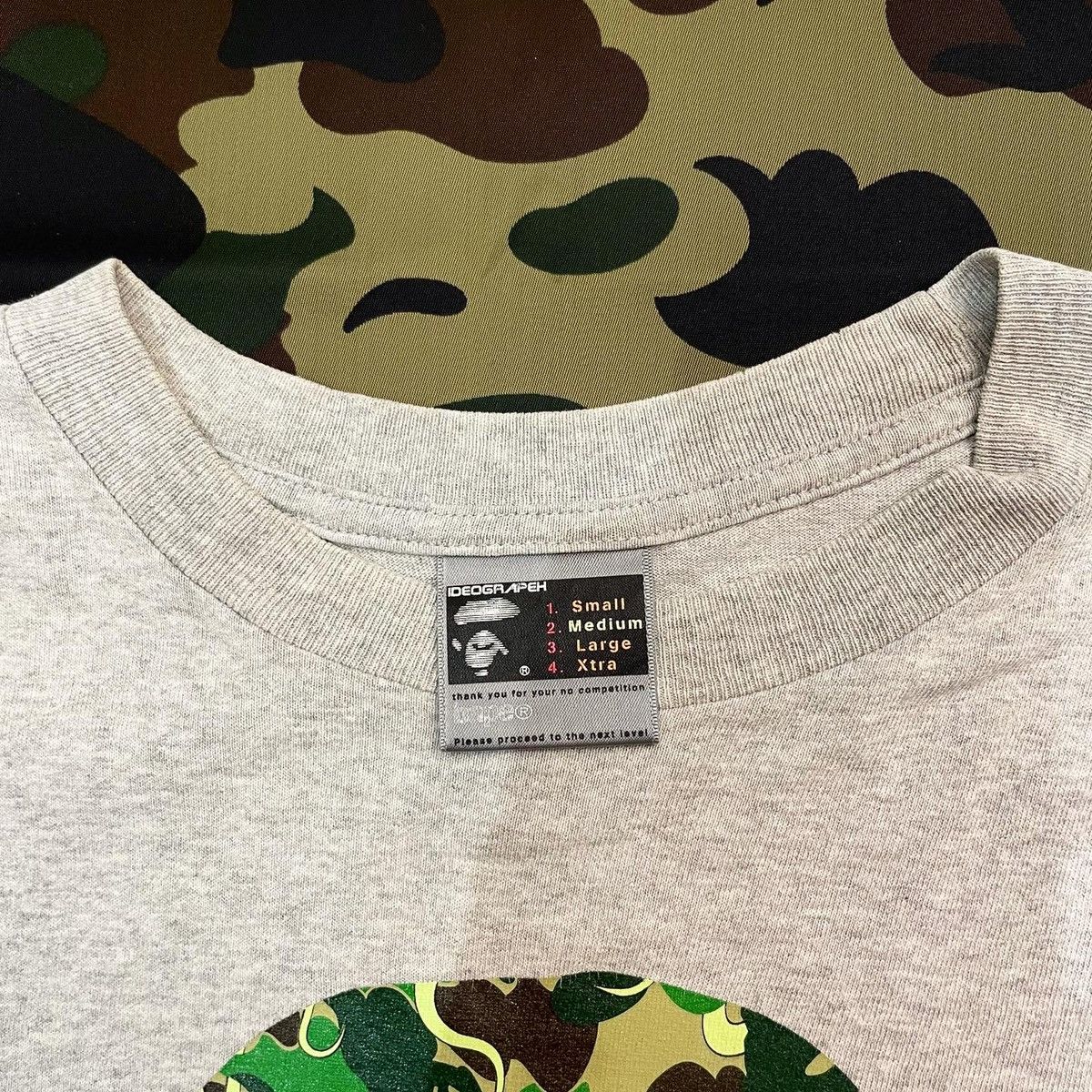 Bape × Kaws BAPE x KAWS ABC CAMO BY BATHING APE TEE Size US M / EU 48-50 / 2 - 3 Thumbnail