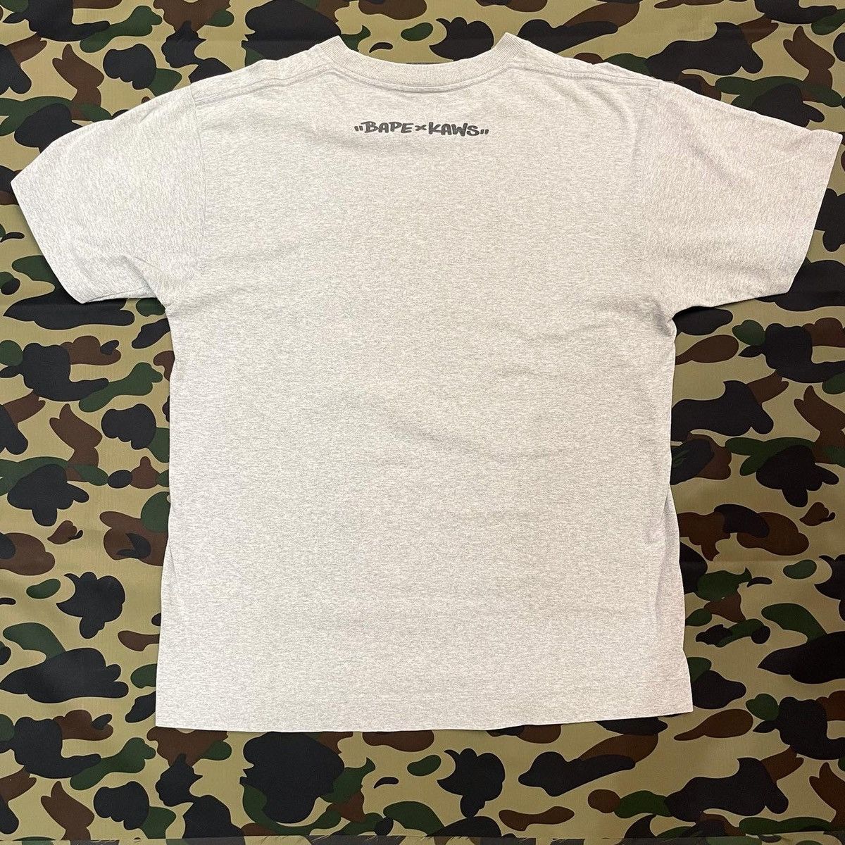 Bape × Kaws BAPE x KAWS ABC CAMO BY BATHING APE TEE Size US M / EU 48-50 / 2 - 5 Thumbnail