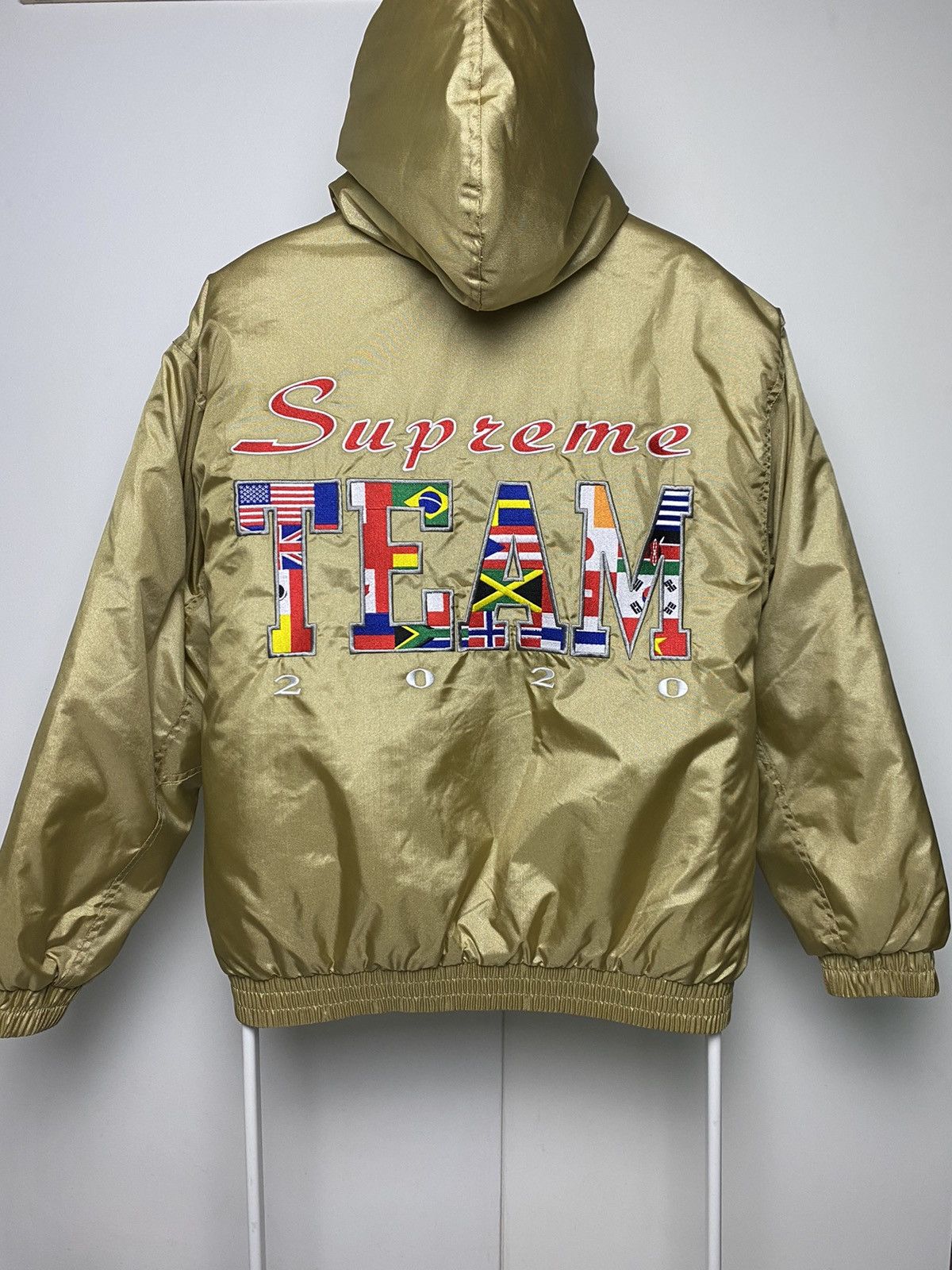 image of Supreme Team Puffy Jacket Gold Big Logo Flags, Men's (Size Medium)