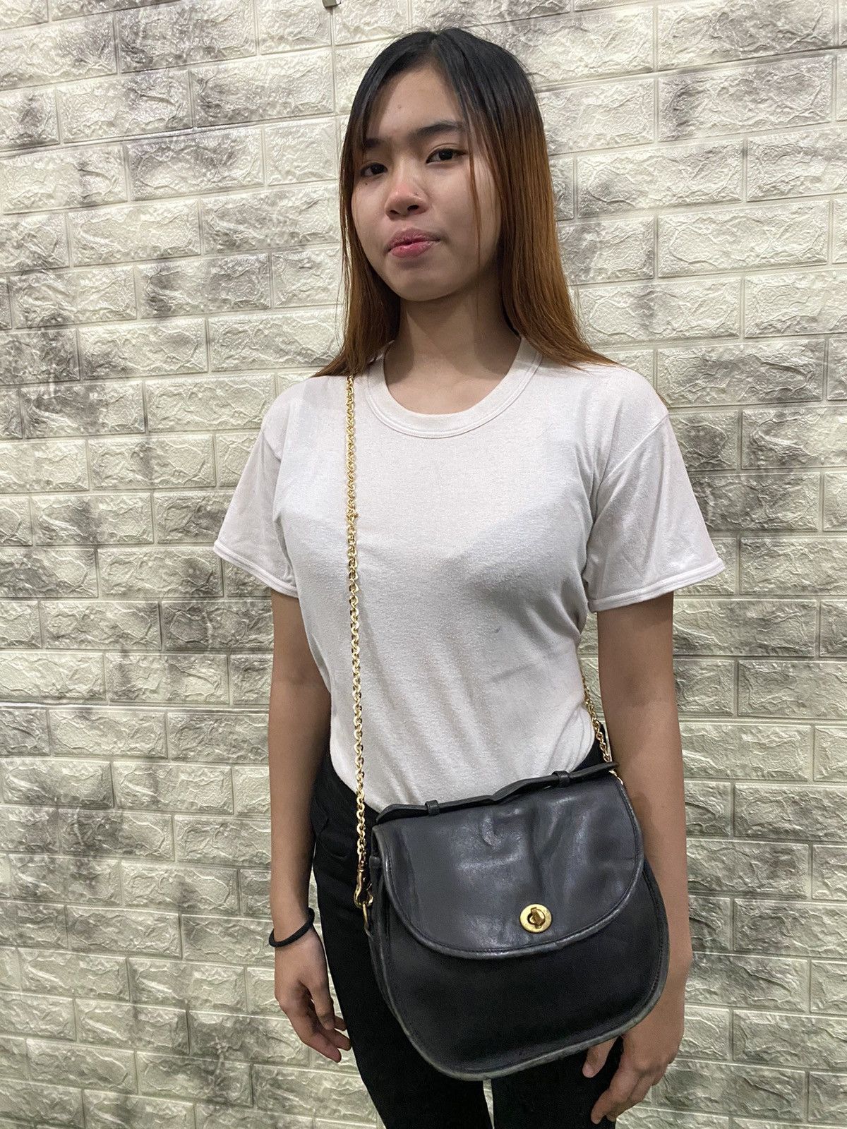 Coach black leather sling bag sales