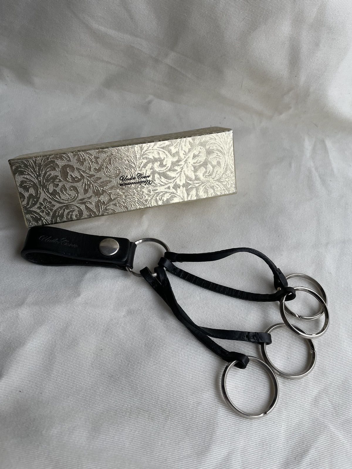 image of Undercover / Undercoverism Key Holder in Black, Men's