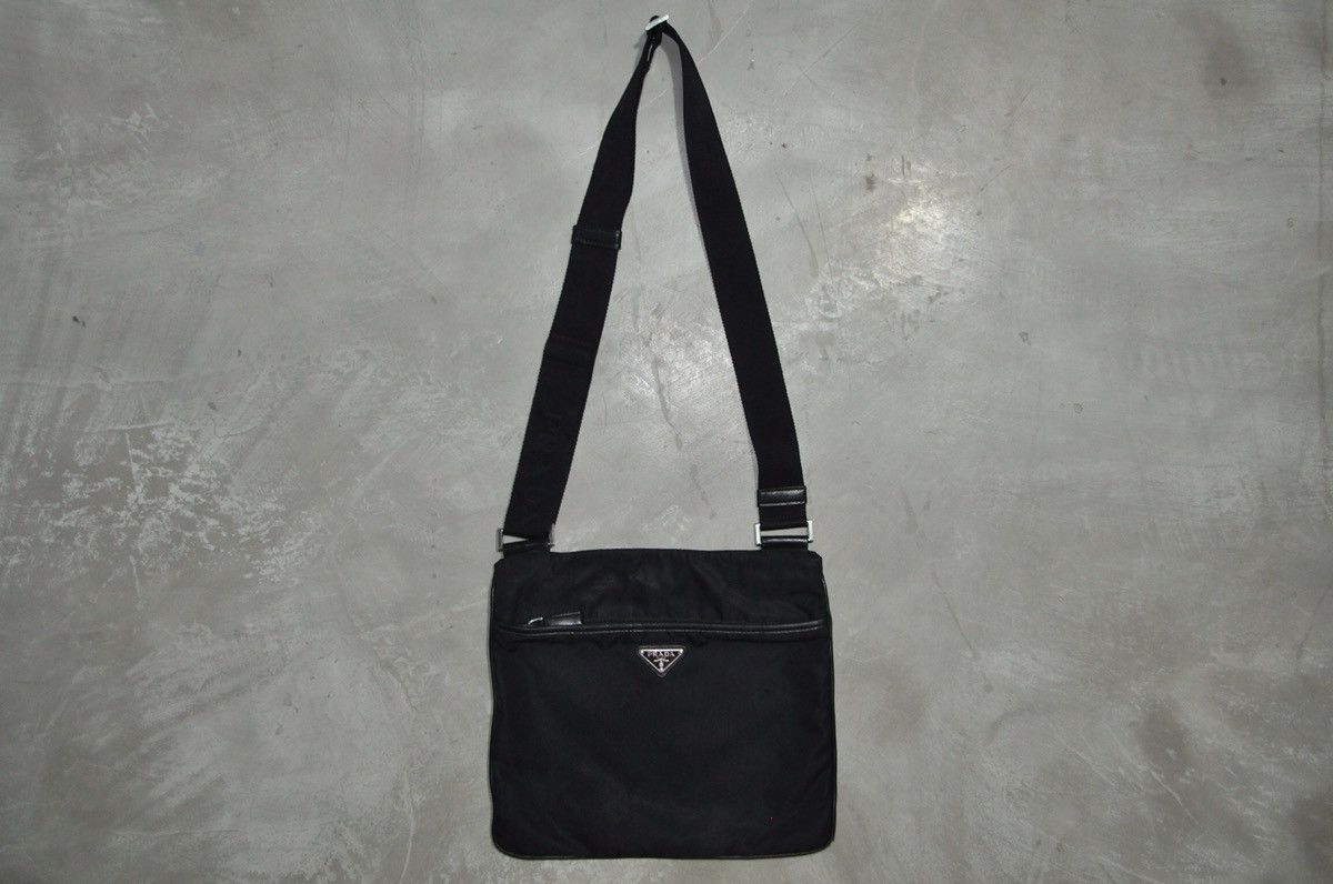 Prada - Vela Saffiano-Trimmed Flat Crossbody Bag