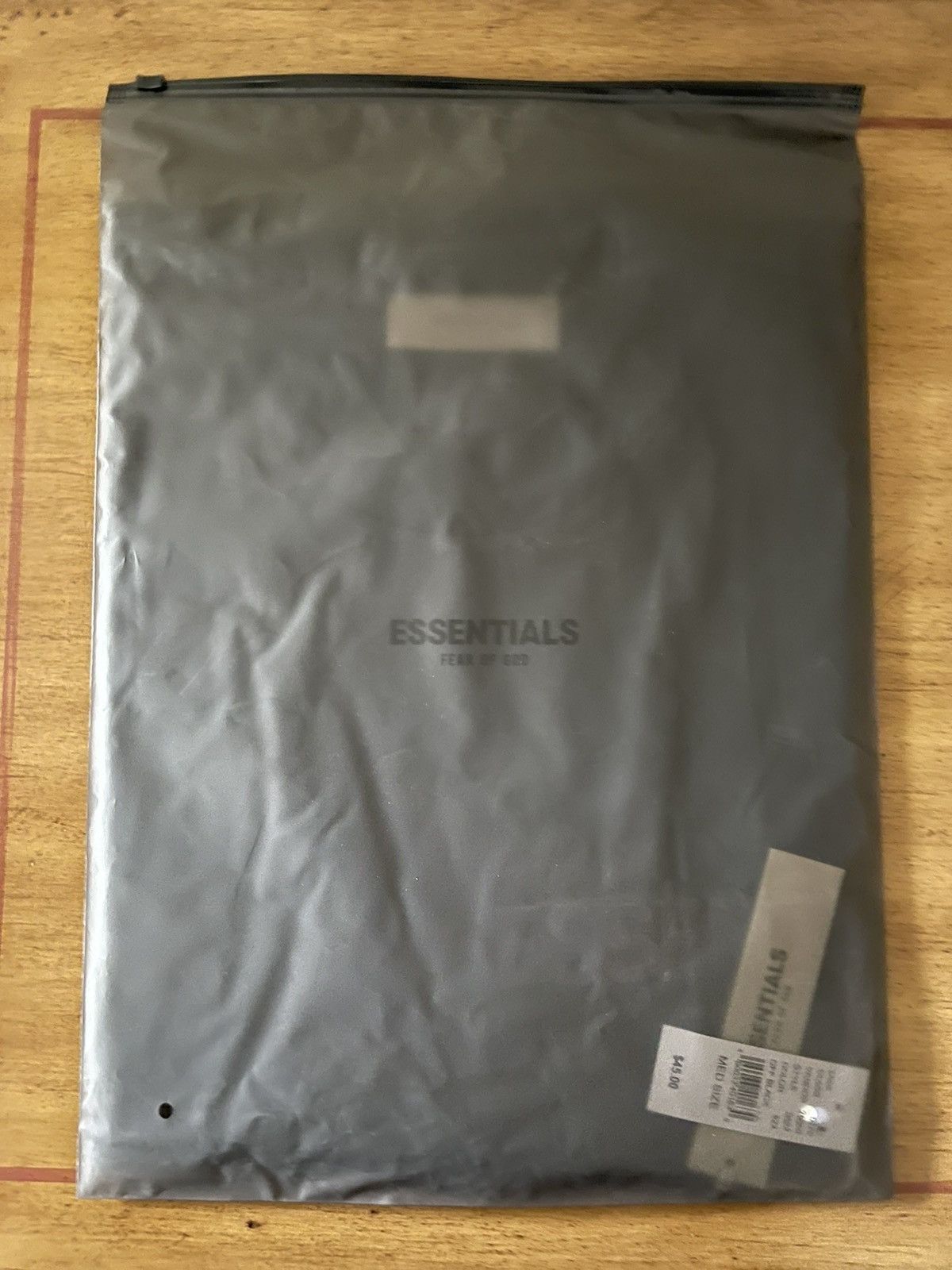 FOG × Fear of God × Pacsun FOG - Essentials Fear Of God Off Black SS T-Shirt Sz (M) Size US M / EU 48-50 / 2 - 4 Thumbnail
