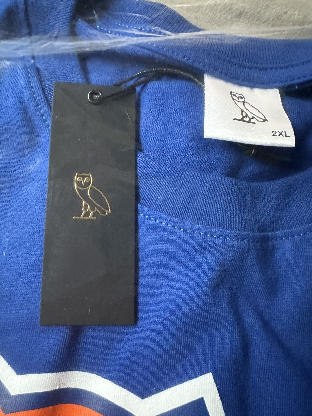 NBA × October's Very Own OVO x NBA New York Knicks OG Owl T-Shirt RARE new with tags Size US XXL / EU 58 / 5 - 7 Thumbnail