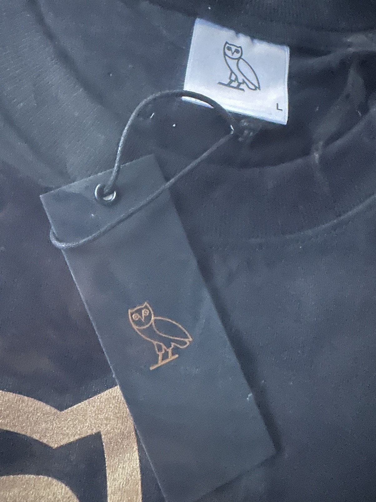 NBA × October's Very Own RARE OVO x NBA Toronto Raptors OG OWL T-SHIRT new with tags Size US L / EU 52-54 / 3 - 7 Thumbnail