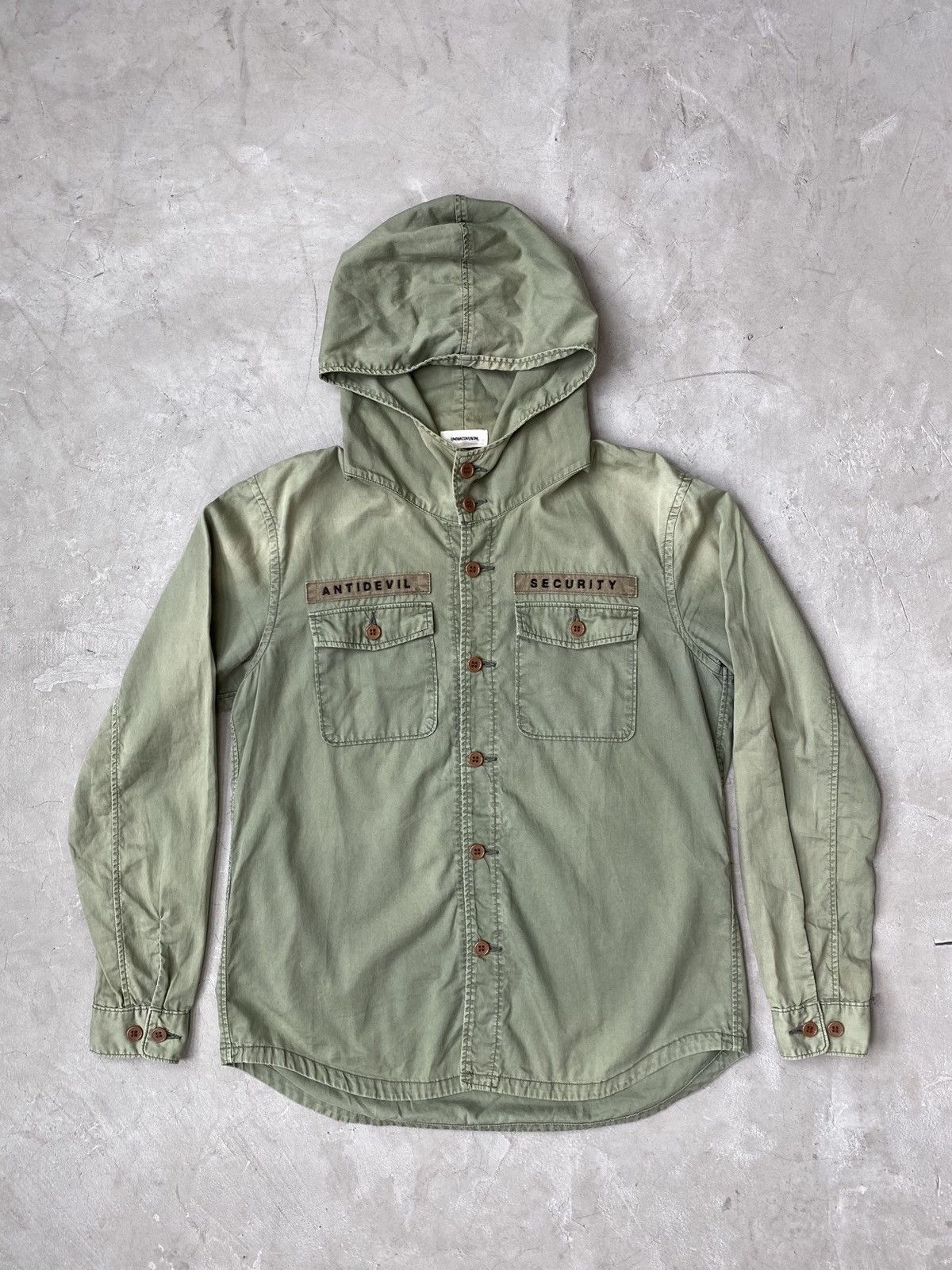 image of Undercover “Anti-Devil” Military Hooded Jacket in Olive, Men's (Size Medium)