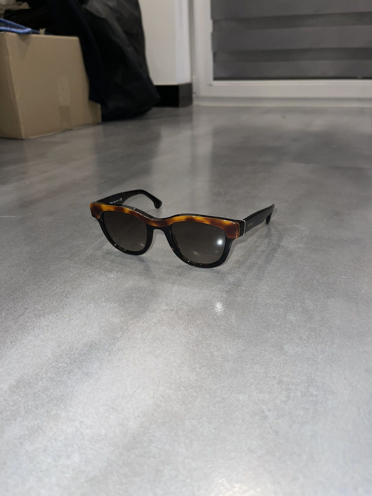 Prada Prada SPR27P MA4-1X1 Tiger Black Sunglasses Size ONE SIZE - 1 Thumbnail