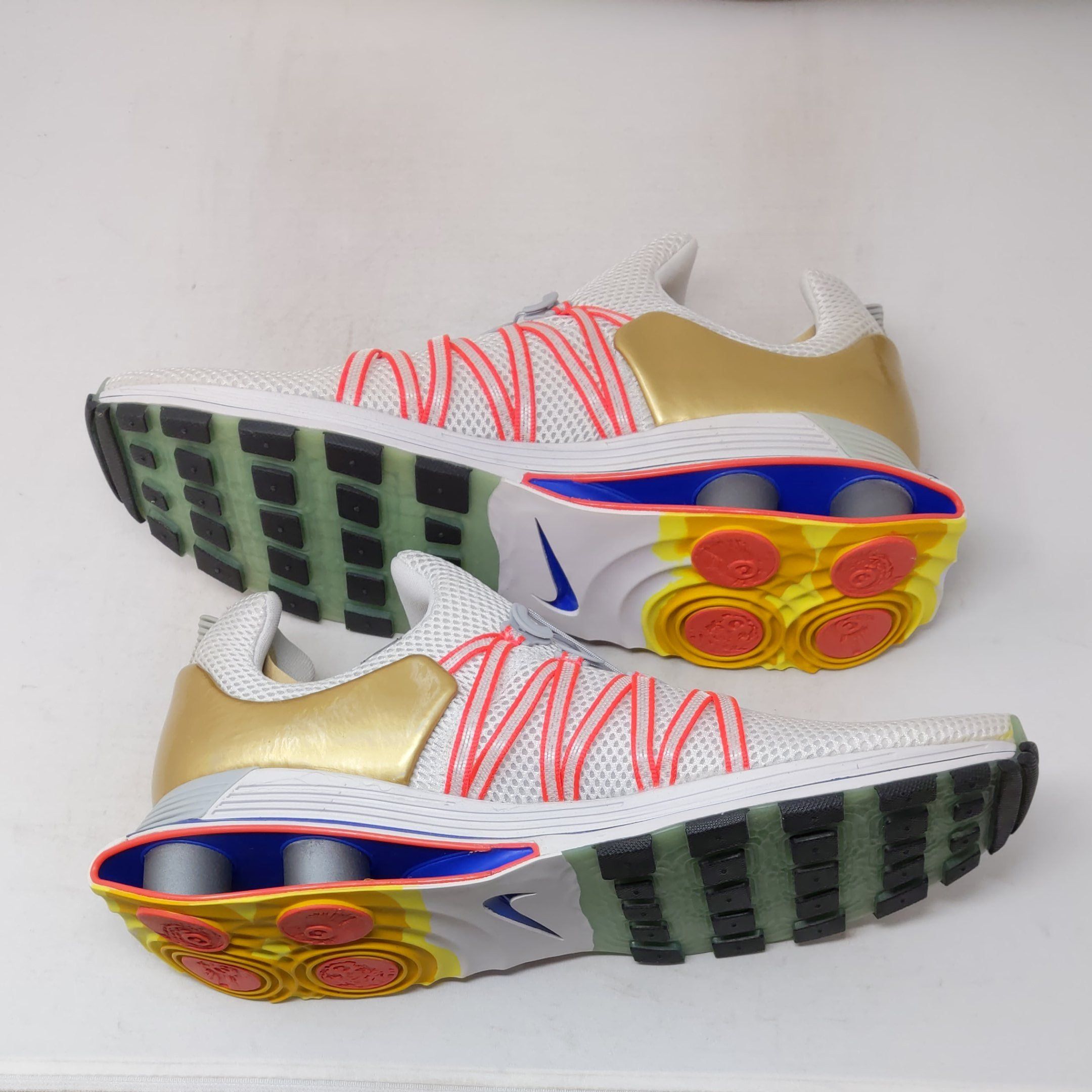 shox gravity metallic gold