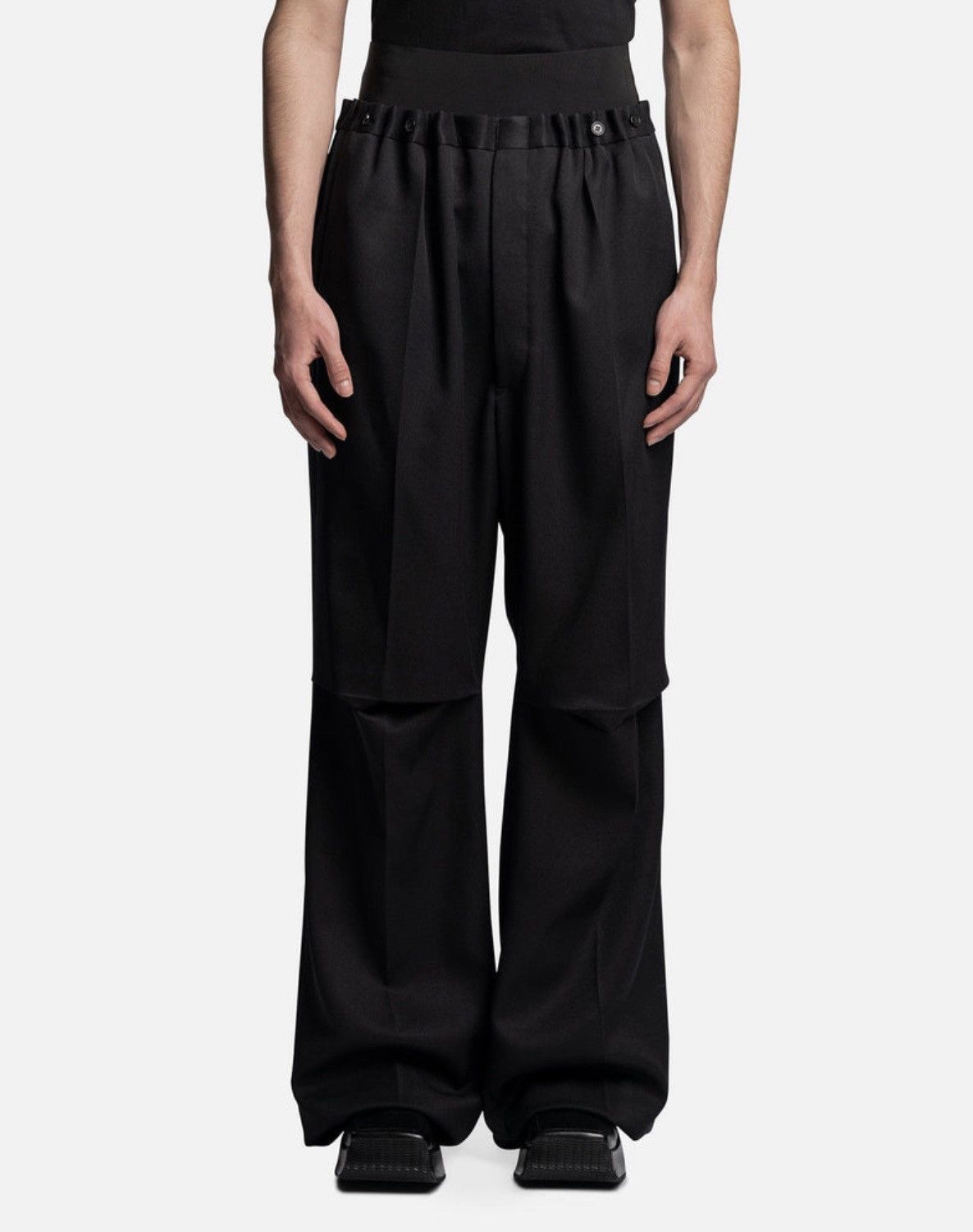 image of Raf Simons Wool Wide-Leg Flared Trousers in Black, Men's (Size 30)