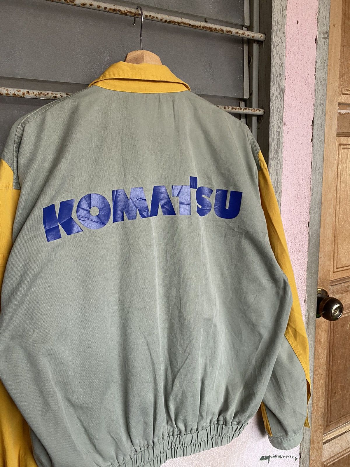 image of Sports Specialties x Vintage Steals Vinatge Komatsu Spellout Workers Jacket in Grey (Size Large)