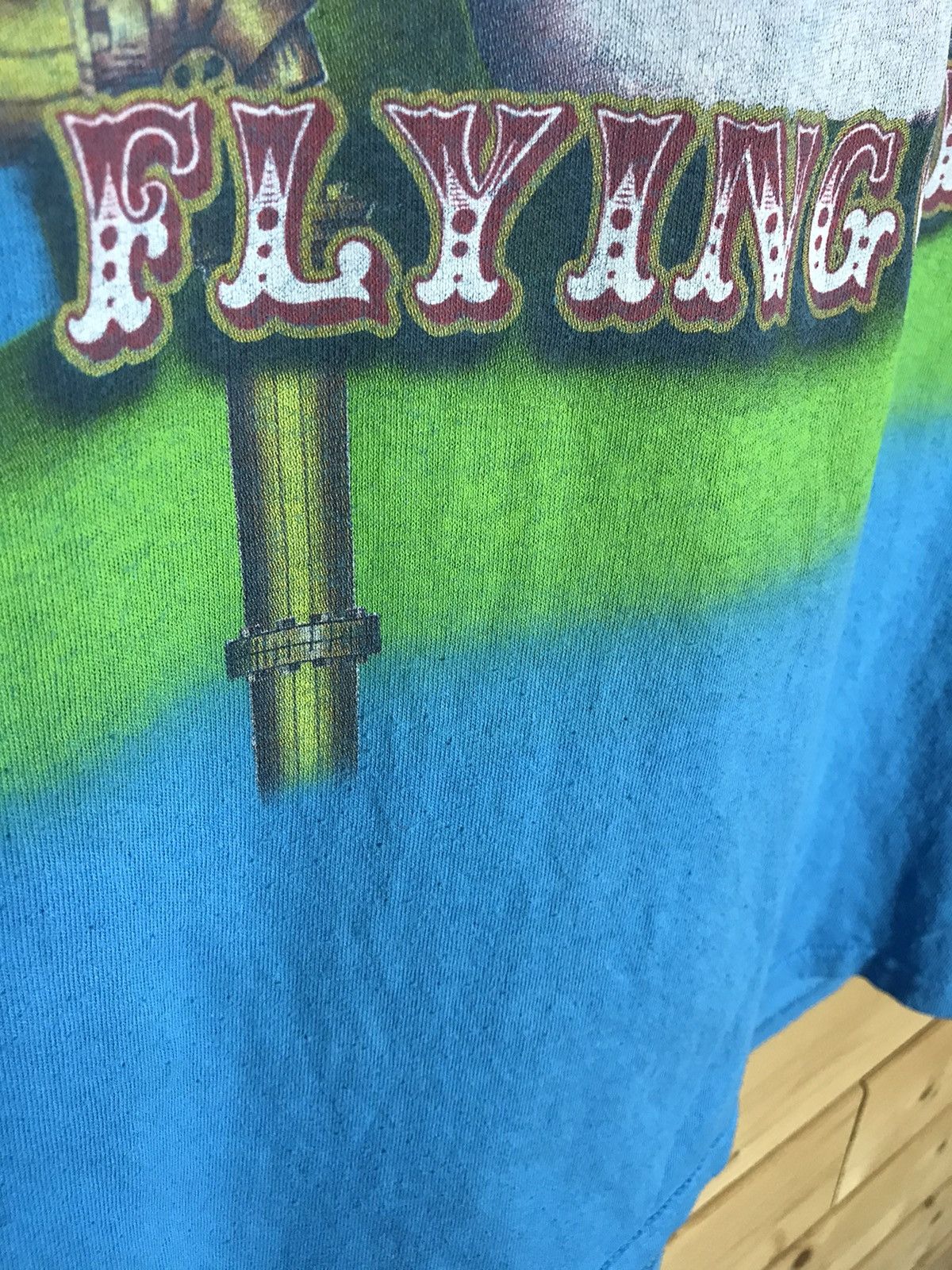 Band Tees Monty Phytons liquid blue t-shirt Size US XL / EU 56 / 4 - 6 Thumbnail