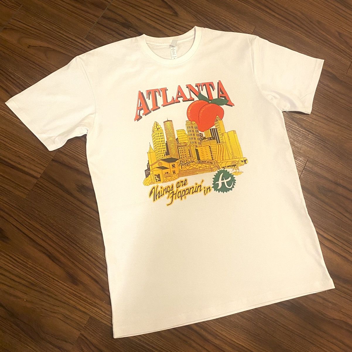 image of Atlanta Georgia Peach Tourist Vintage 90's Style White Tee, Men's (Size Large)