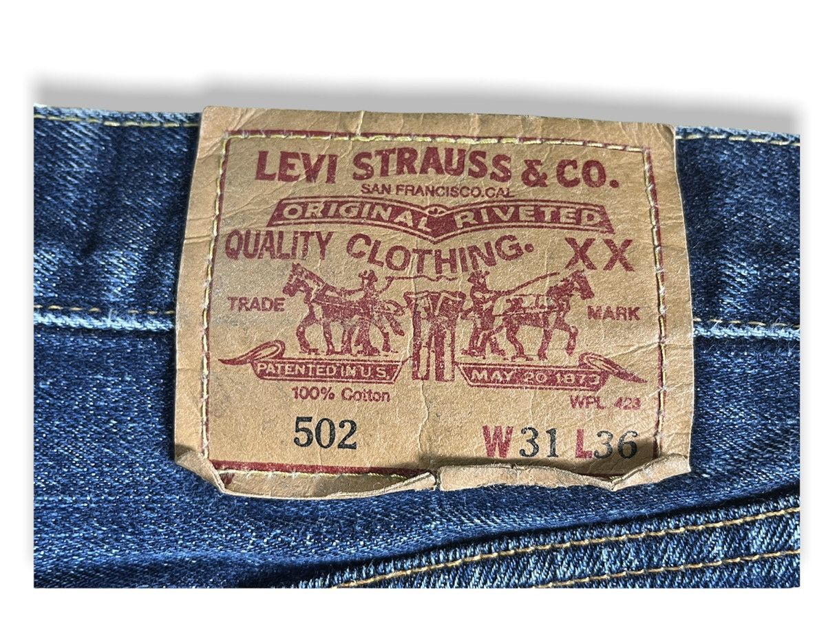 Vintage 1980s Distressed LEVI'S 502 Big E Selvedge