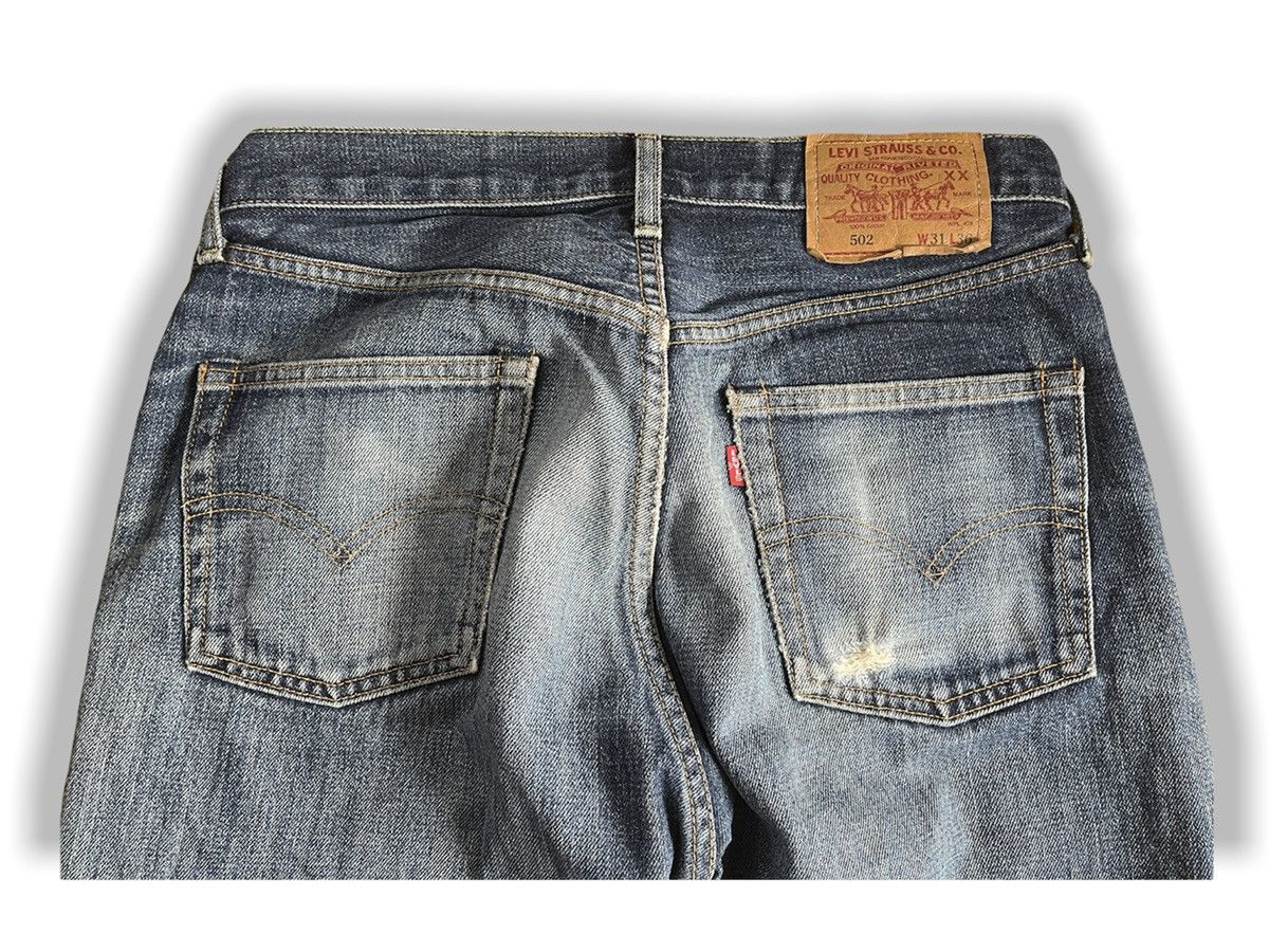 Vintage 1980s Distressed LEVI'S 502 Big E Selvedge