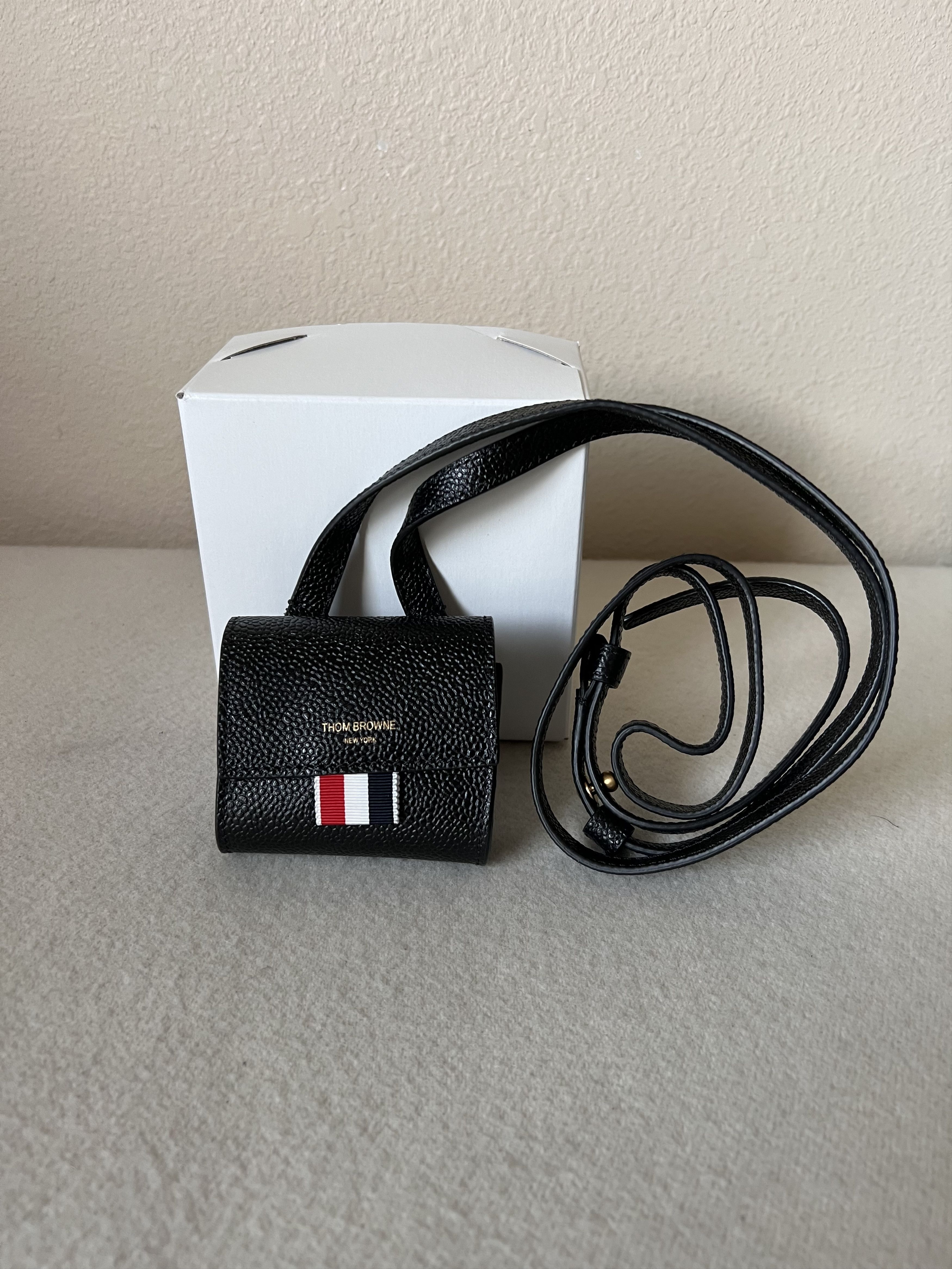 Thom Browne Thom Browne Pebble Grain Leather Mini Pouch in Black Size ONE SIZE - 1 Thumbnail