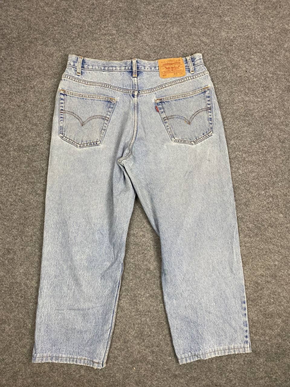 image of Vintage Levis 550 Lightwash Distressed Denim in Light Blue, Men's (Size 35)