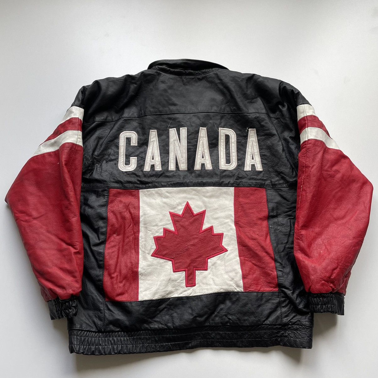 image of 90's Canada Flag Embroidered Graphic Leather Jacket in Black, Men's (Size XL)