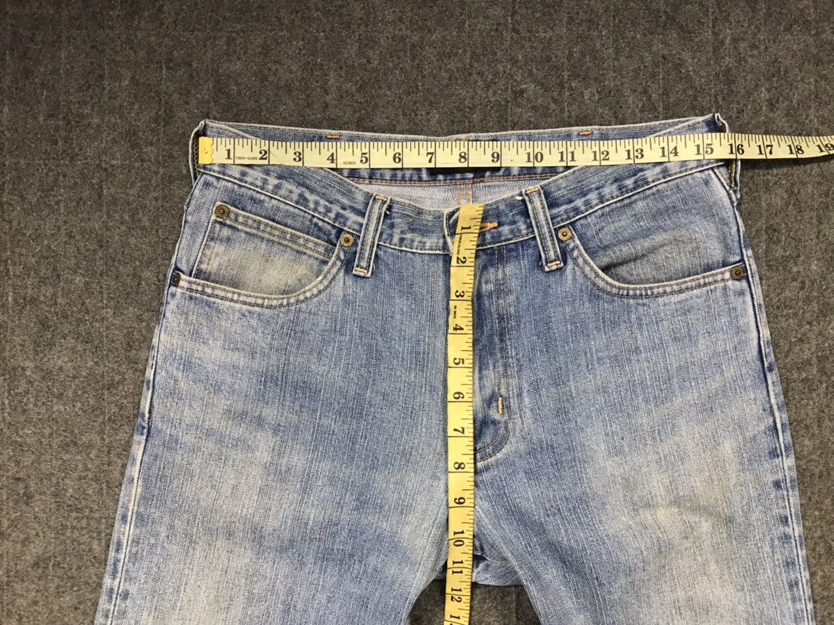 Japanese Brand Vintage Wrangler Light Wash Zipper Jeans Style Size US 31 - 17 Thumbnail