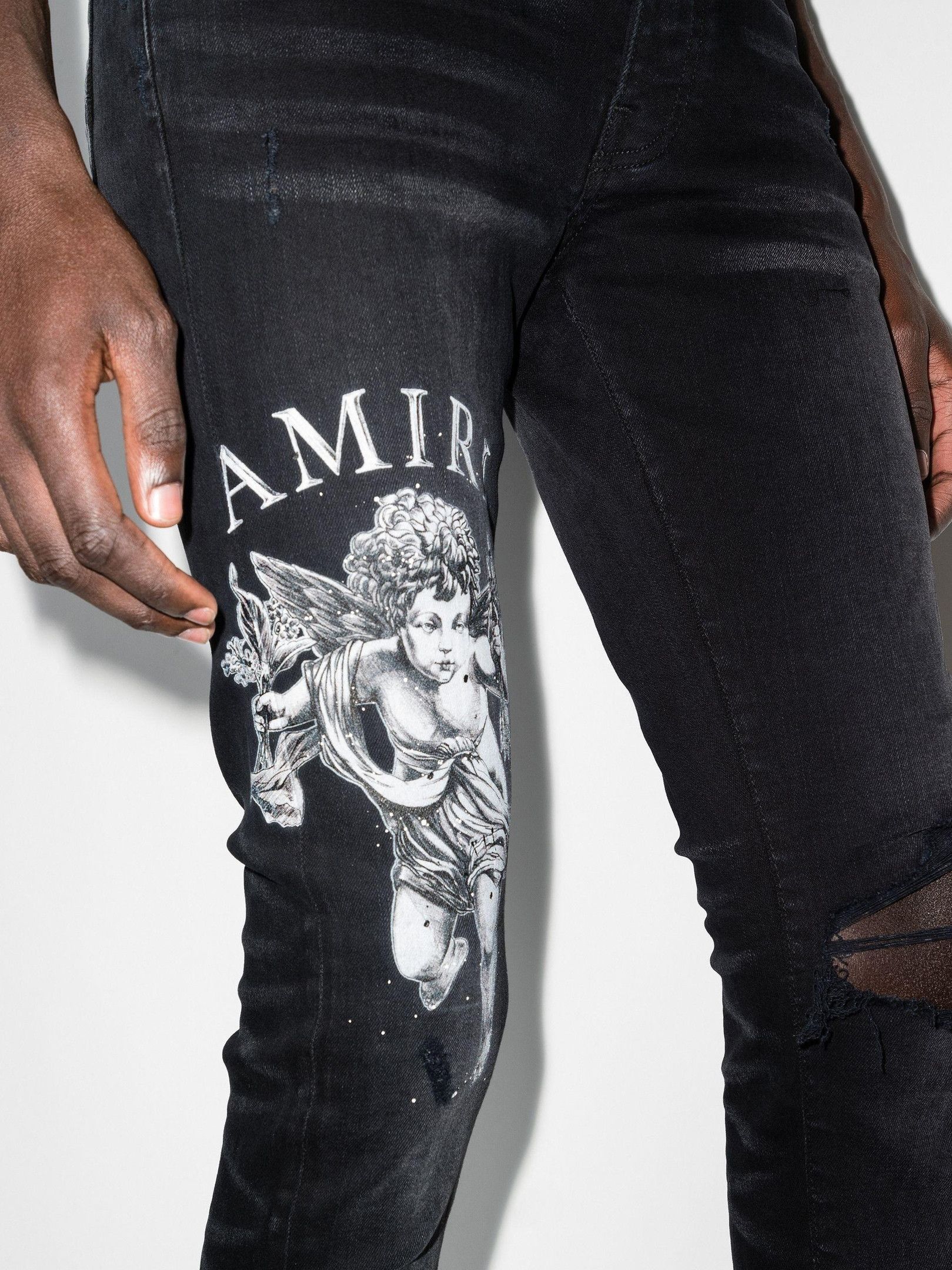 Amiri Amiri Cherub Print Jeans in Aged Black | Grailed