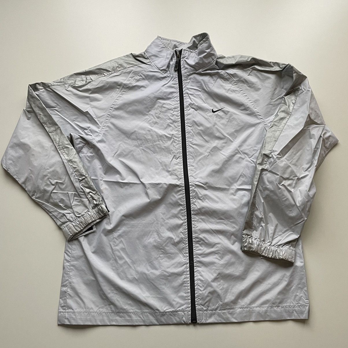 image of Y2K Nike Embroidered Swoosh Windbreaker Jacket Grey in Silver, Men's (Size Medium)