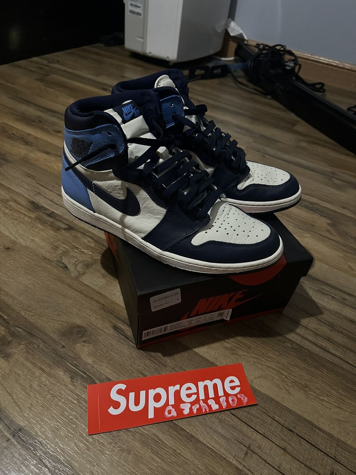 image of Jordan Nike Jordan 1 Retro High Obsidian Unc Shoes in Blue/White, Men's (Size 12)
