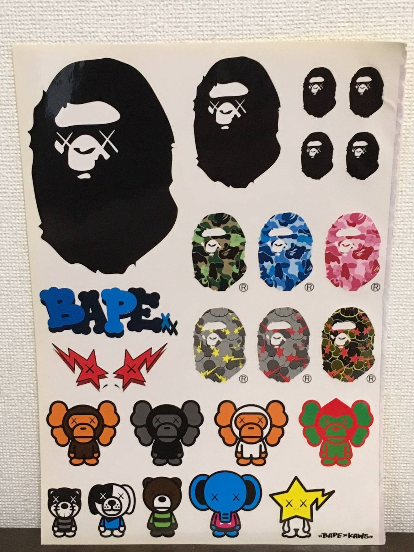 Bape x Kaws Logo Sticker Sheet Camo