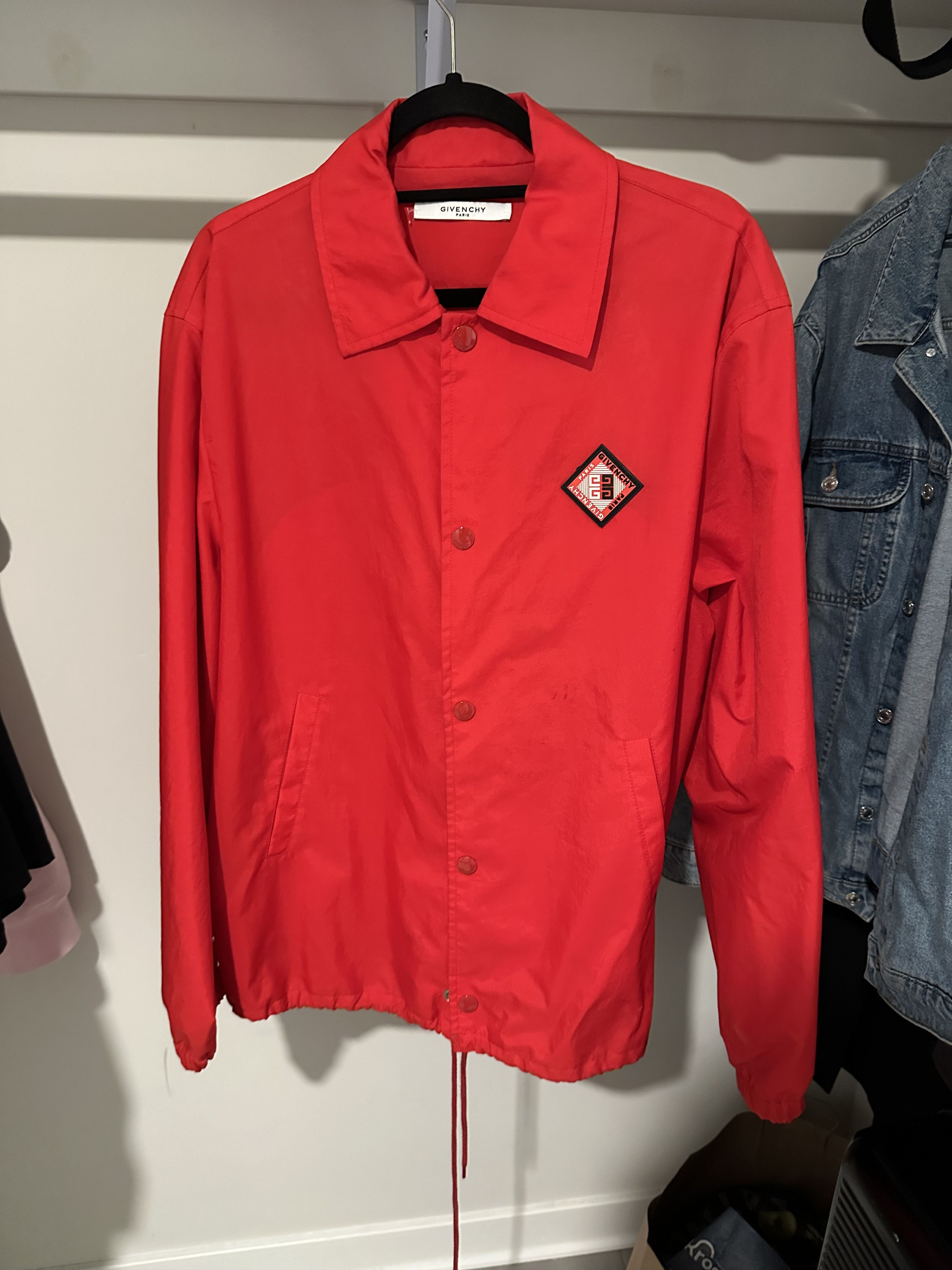 red windbreaker