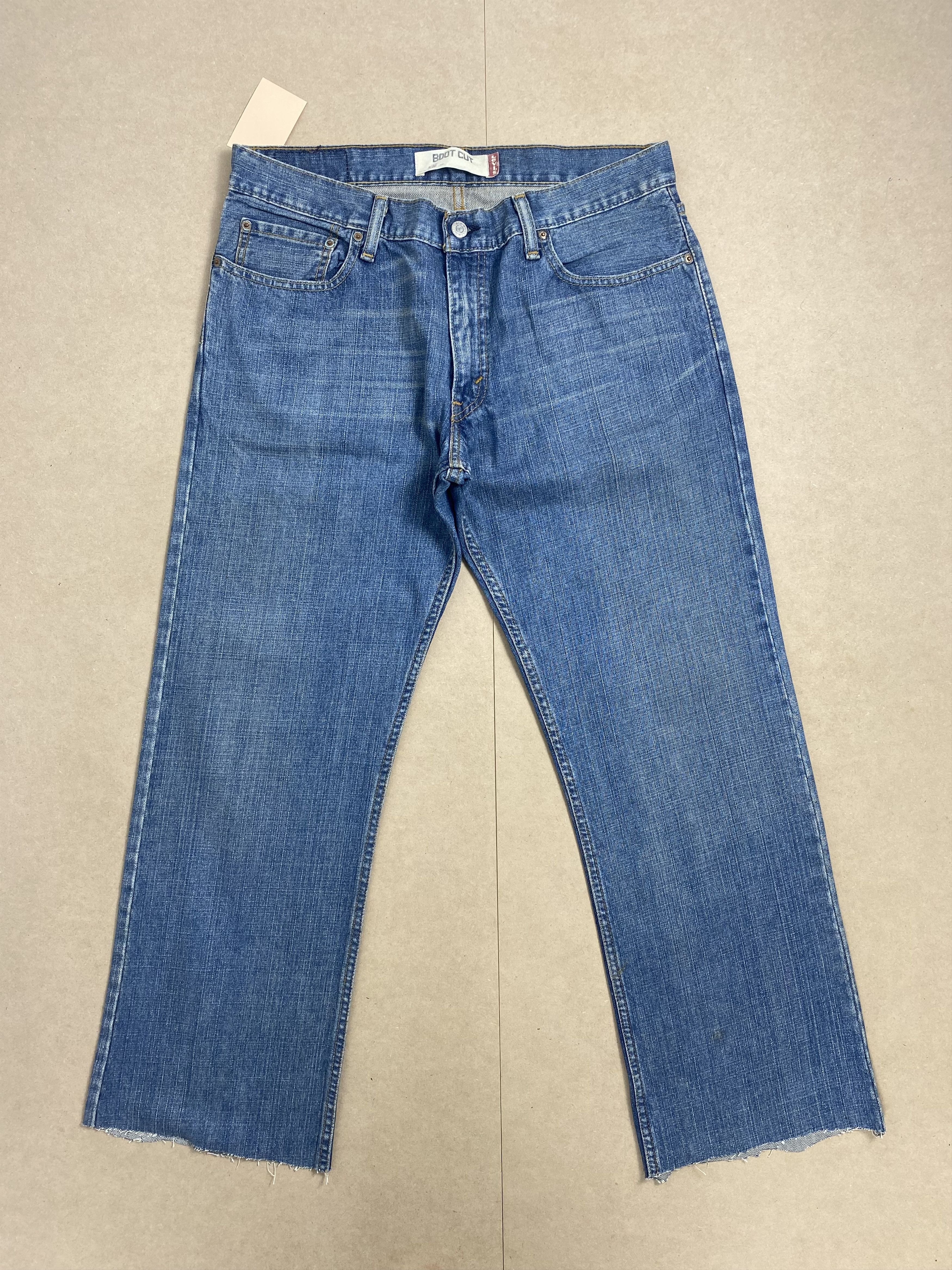 image of Levis x Vintage Levi's 527 Bootcut Distressed Faded Mid Wash Jeans in Midwash, Men's (Size 35)